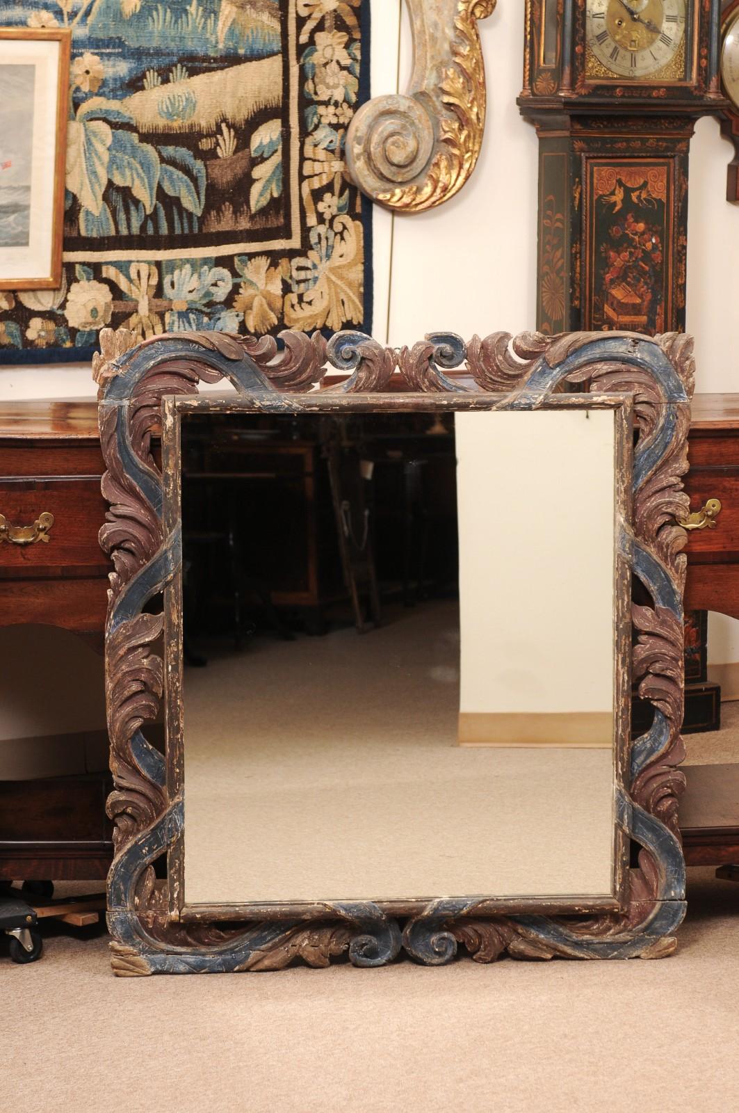 Marco italiano del siglo XVII tallado y pintado en azul y rojo con placa de espejo tardía Italiano en venta