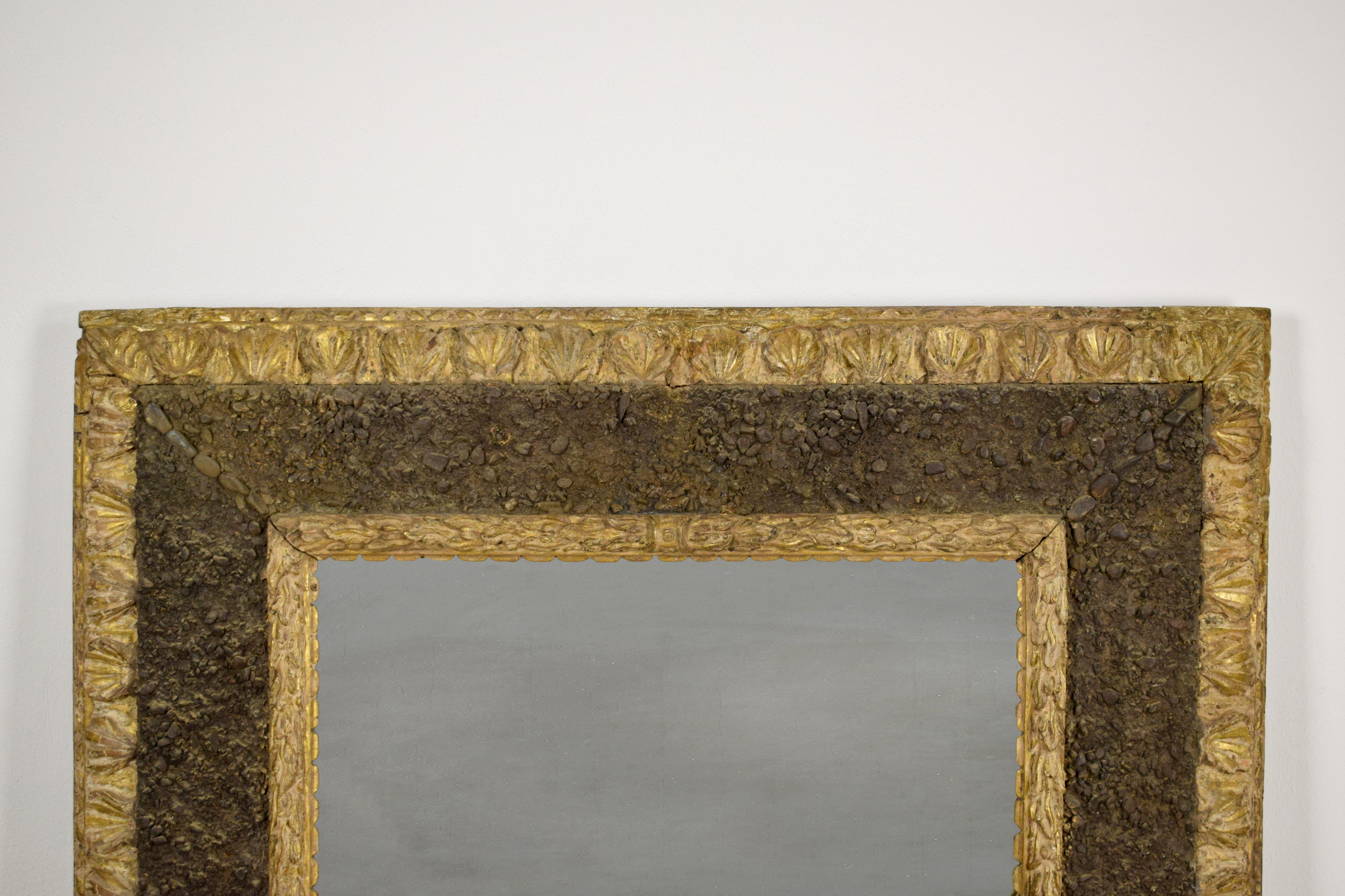 Hand-Carved 17th Century, Italian Carved Giltwood Mirror with Small Stones For Sale