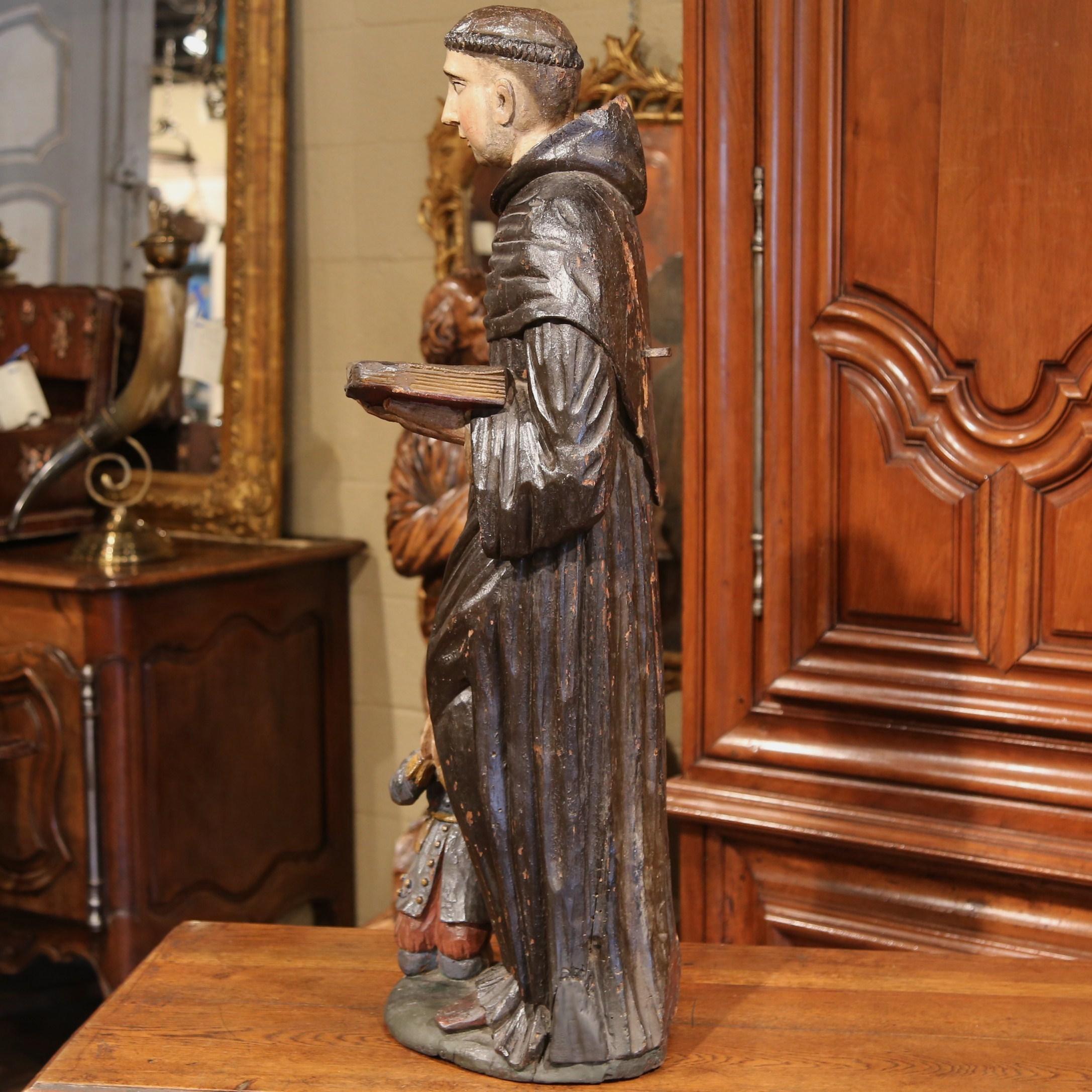 Composición escultórica italiana del siglo XVII San Nicolás tallado y pintado 4