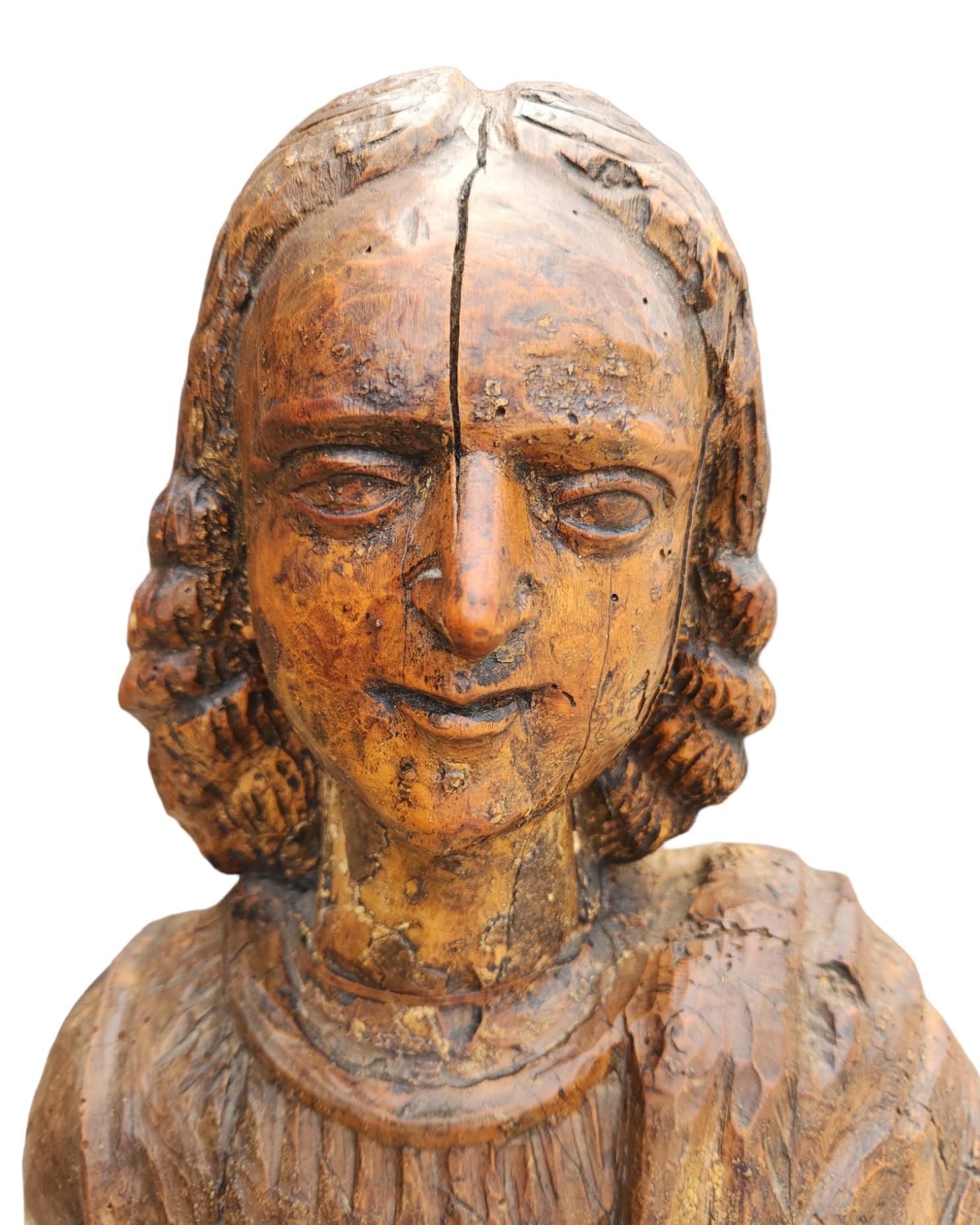 Wood 17th Century Italian Carving of Scholar For Sale