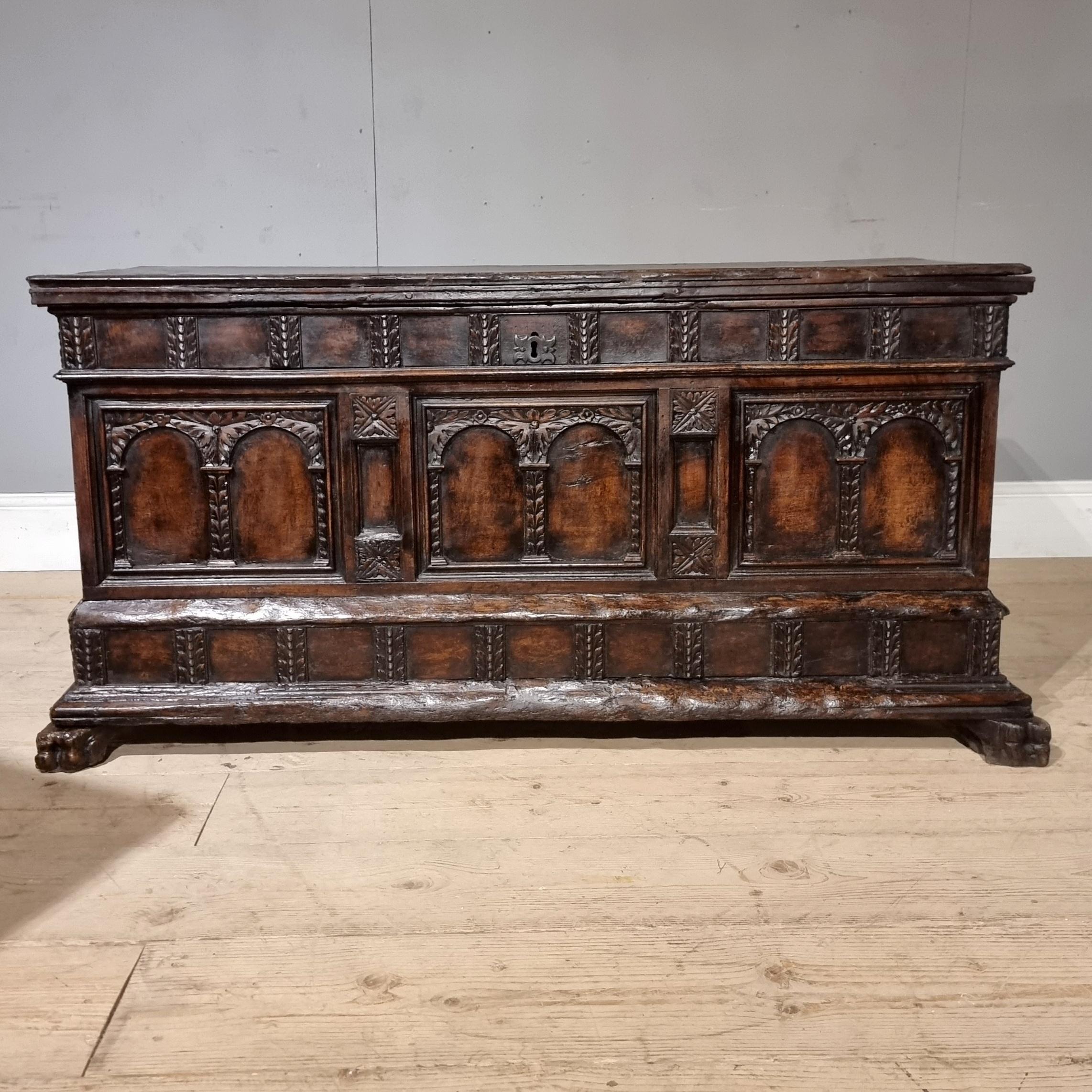 Late 17th C Italian carved walnut cassone coffer on paw feet with a wonderful inside carved panel. Beautiful rich colour and intricate hand carved details. 1690.

In very good condition, only showing signs of wear on lid and bottom rails as shown in