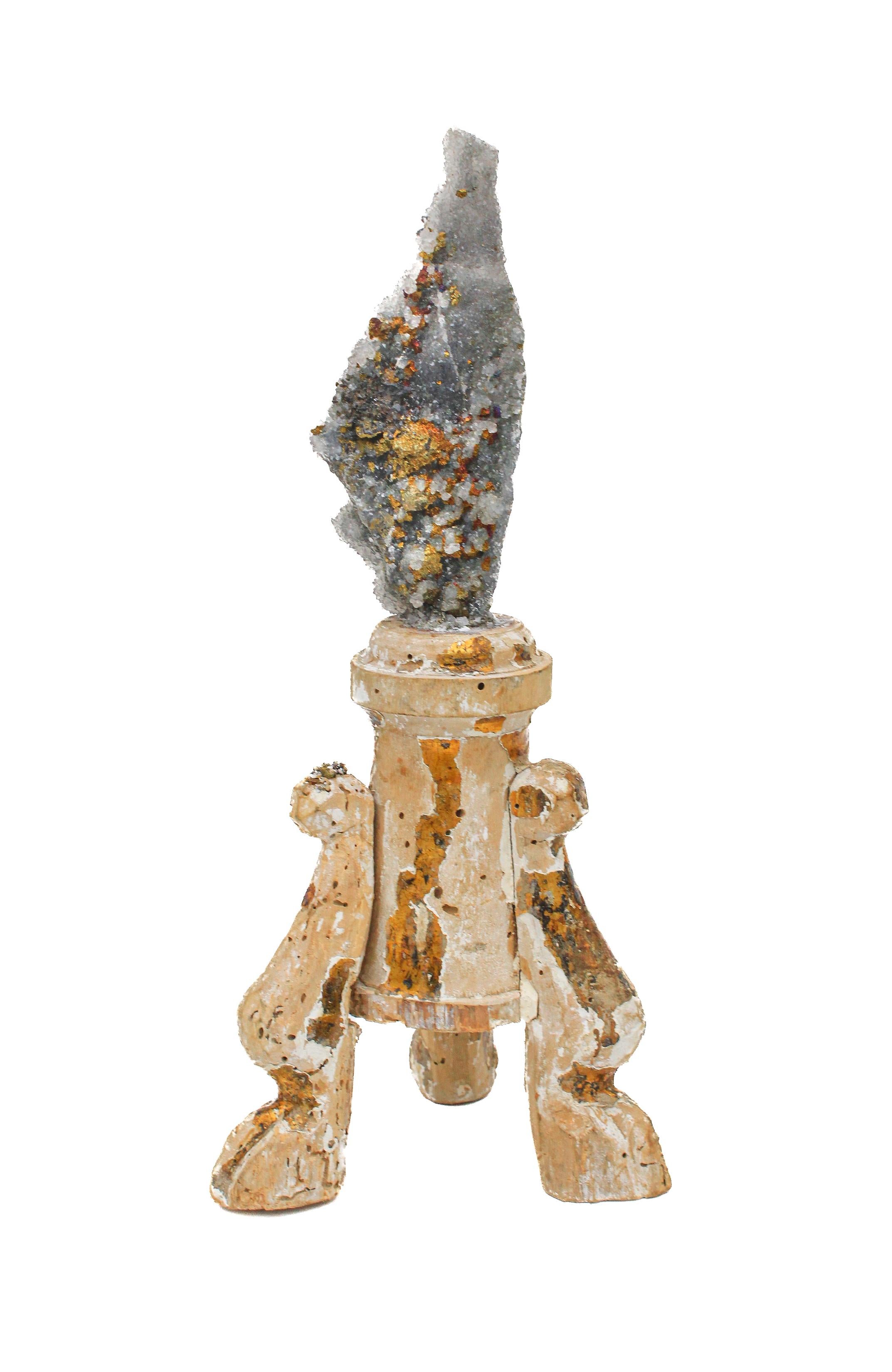 17th century Italian fragment mounted with chalcopyrite in a druzy crystal matrix.

This fragment was originally part of a candlestick from a church in Italy. It is distressed from time but still has the original mecca gold leaf on aspects of the