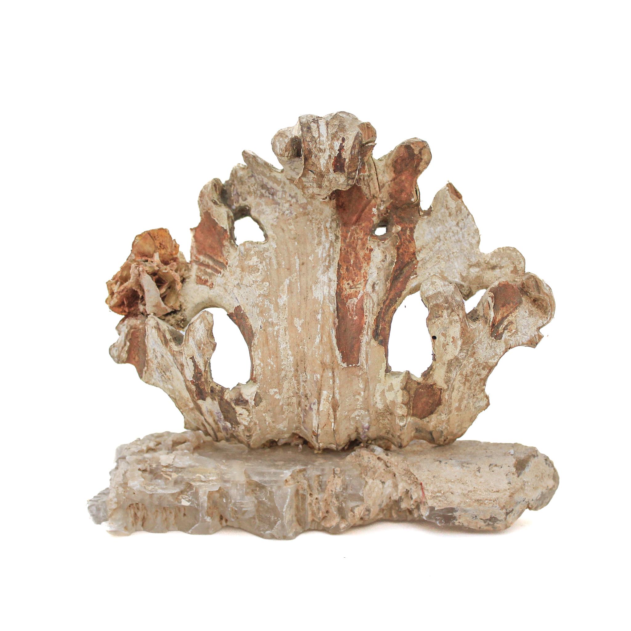 17th century Italian fragment with wulfenite on a fishtail selenite base

This fragment is from a church in Florence. It was found and saved from the historic flooding of the Arno River in 1966.

The piece has been naturally distressed from the