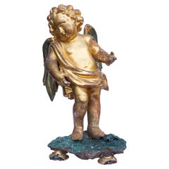 Ange italien du XVIIe siècle, doré, orné de malachite et de cristaux de quartz fantôme rouge