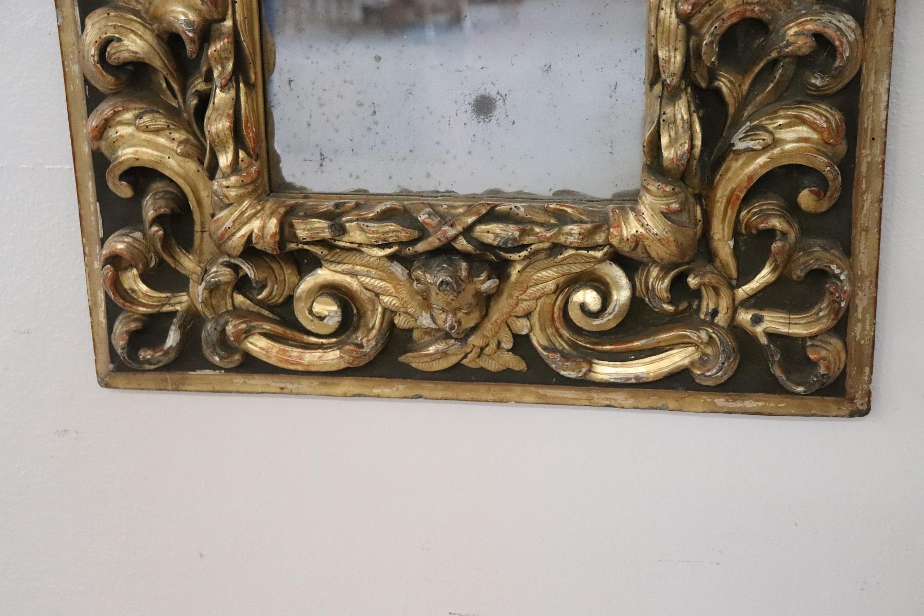 Important rare antique Louis XIV mirror authentic Baroque period. Great carving in wood decoration with acanthus leaves and little angels. Beautiful gilding made of gold leaf. The mirror condition used with its original mercury mirror.
Mirror of
