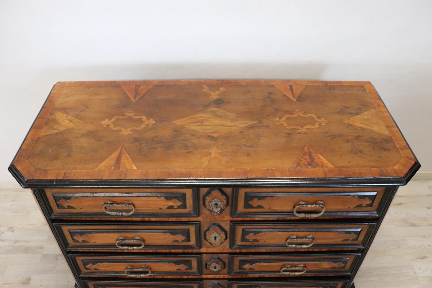 Important antique Italian Louis XIV period chest of drawers 1680s. On the front four large and useful drawers. In the 17th century only important families could afford to have furniture of this value. This chest of drawers comes from an important