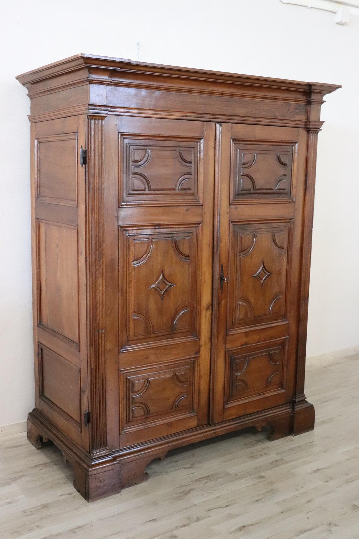 Hand-Carved 17th Century Italian Louis XIV Walnut Hand Carved Majestic Wardrobe or Armoire