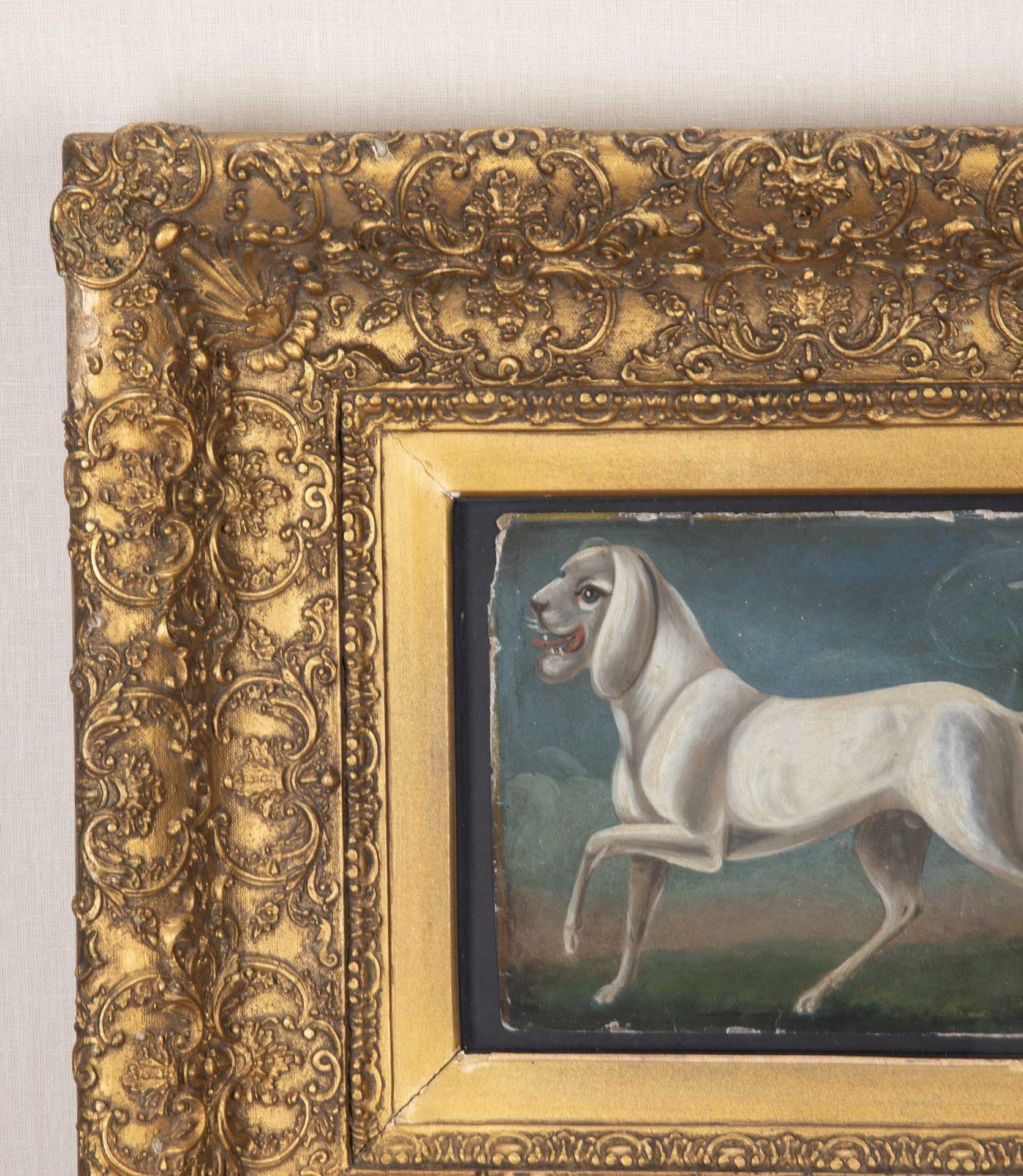 Peinture italienne du 17e siècle représentant un chien. Encadré dans un magnifique cadre doré du 19e siècle.