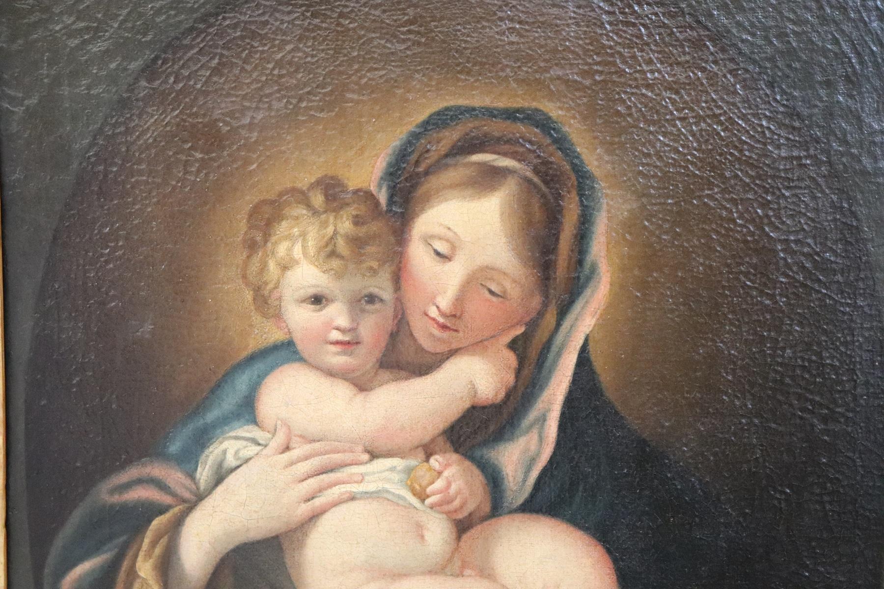 Oil painting on canvas antique high vintage dimensions with frame 68 x 80 without frame 50 x 62.50 datable around the second half of the 17th century XVII. Subject The Madonna della Melagrana with child, a work of the Piedmontese school. The