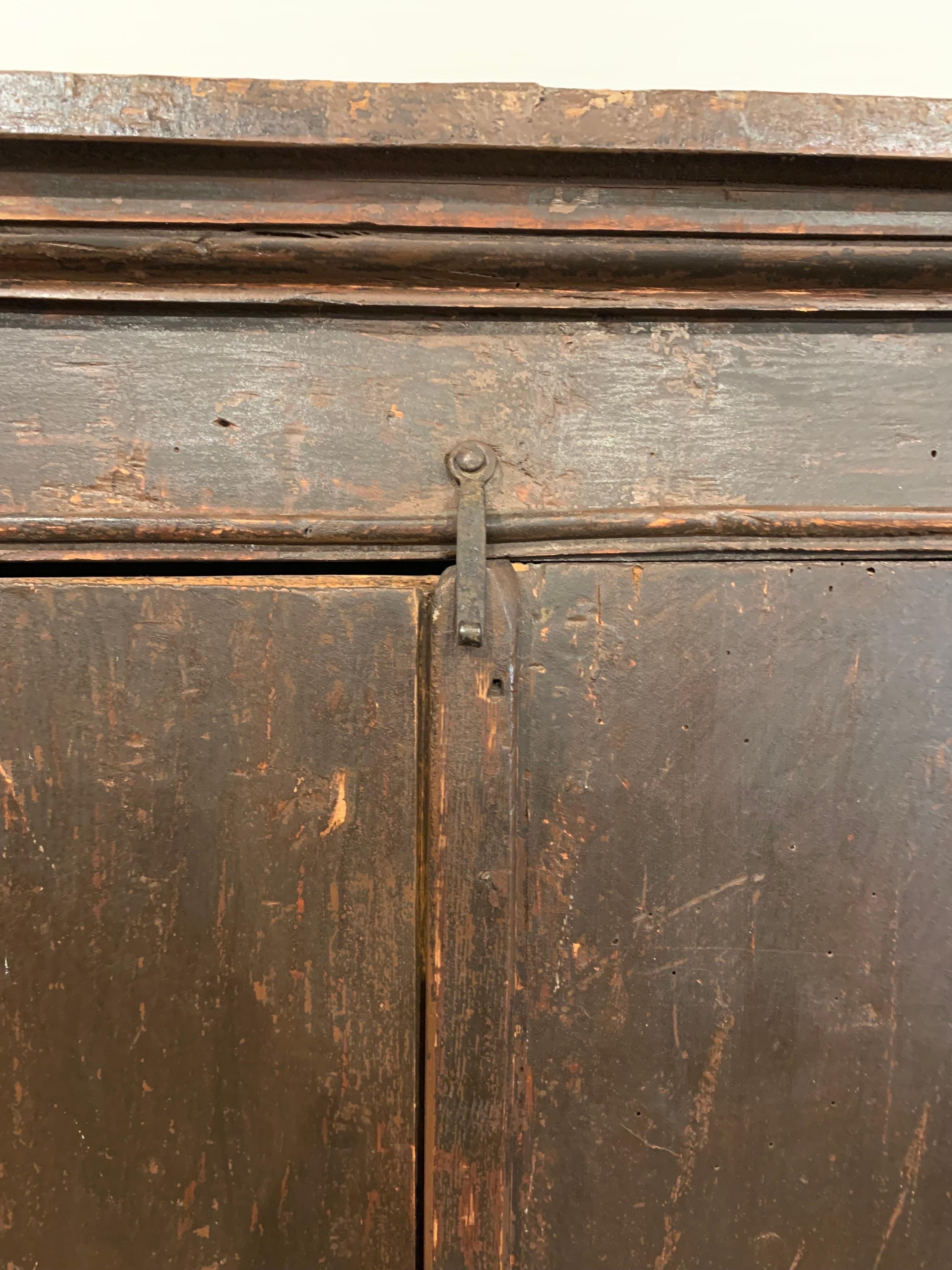 Iron 17th Century Italian Patinated Pine Four Door Cabinet For Sale