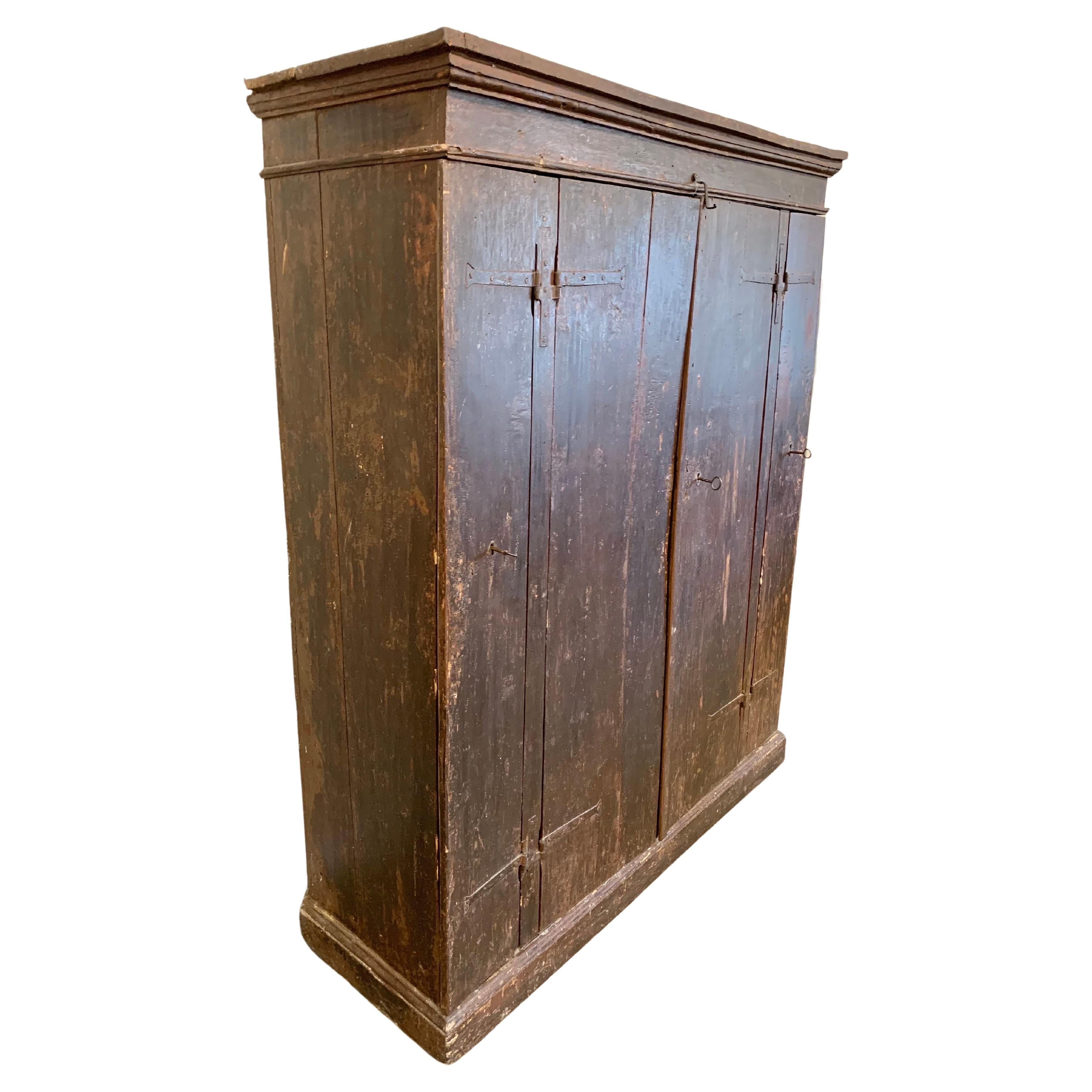 17th Century Italian Patinated Pine Four Door Cabinet For Sale