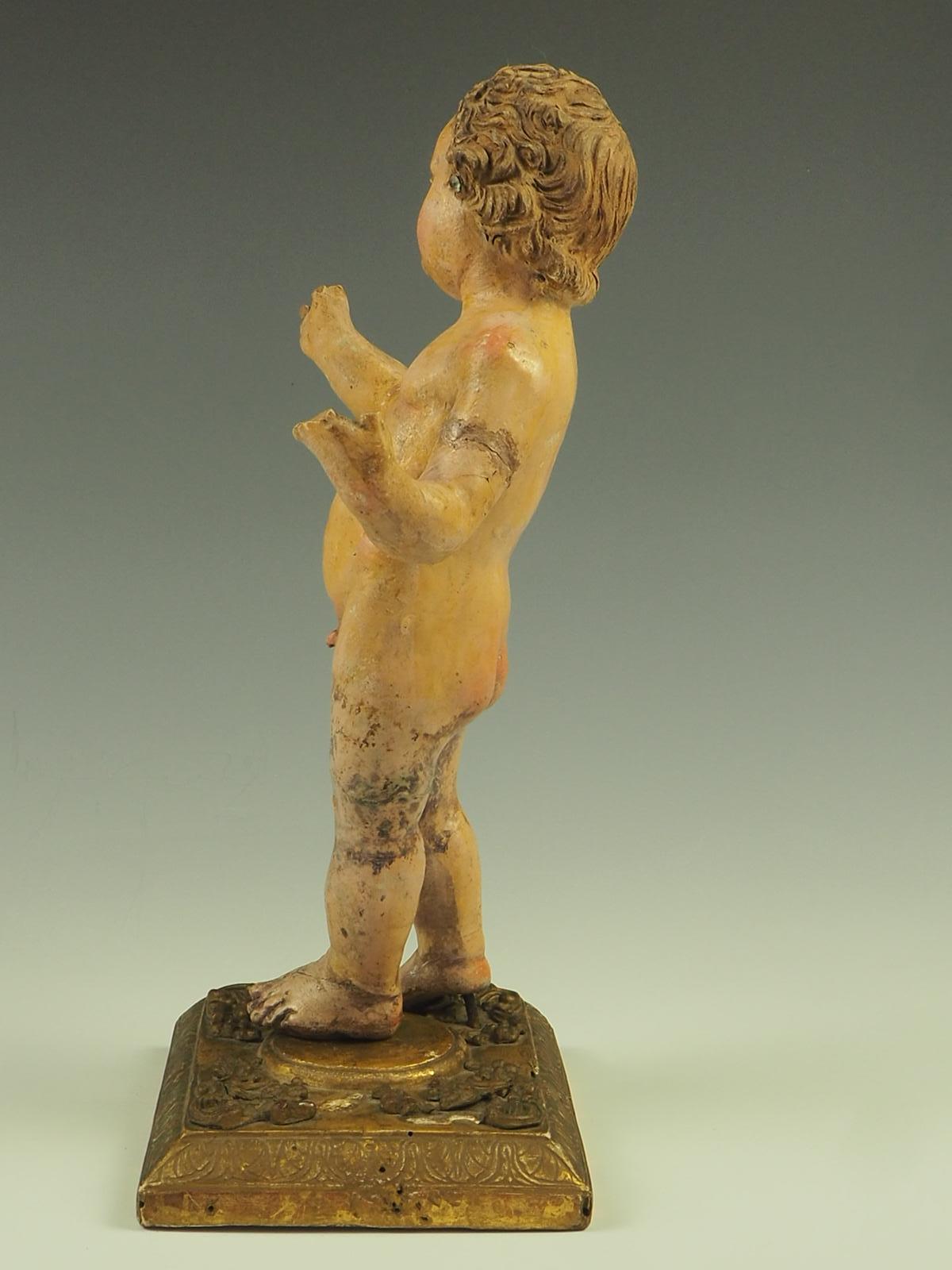 17th Century Italian Polychrome Painted Terracotta Jesus Child Putto Figure In Fair Condition For Sale In Lincoln, GB