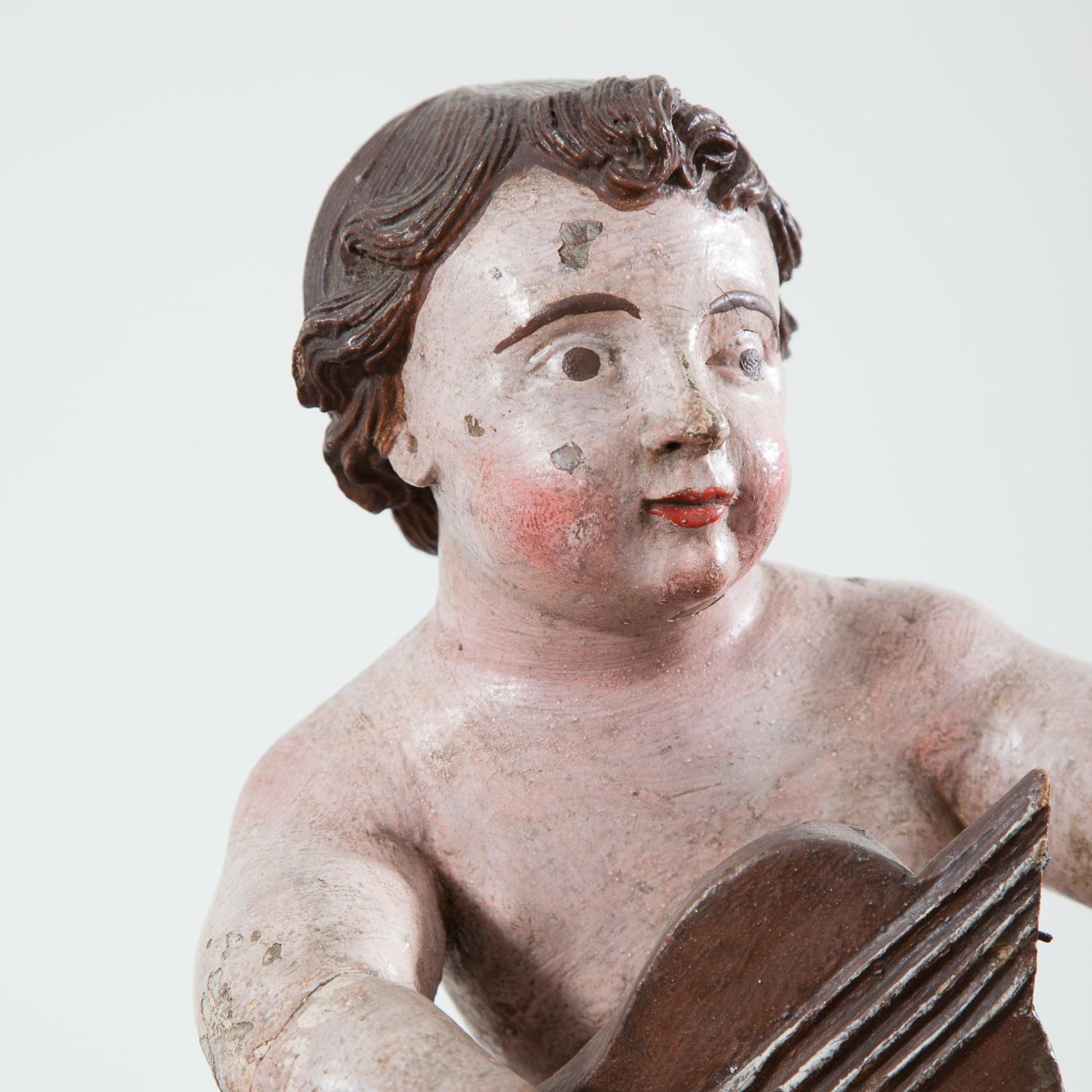 17th Century Italian Carved Painted Putto 2