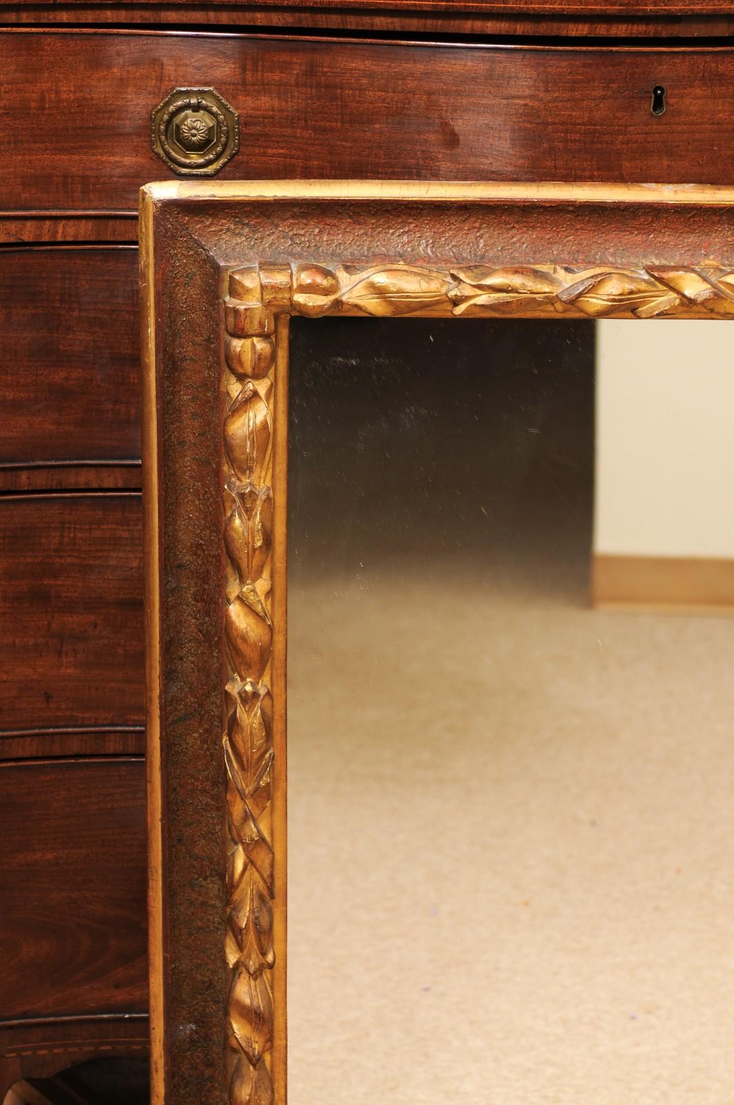 17th Century Italian Rectangular Brown Painted and Carved Parcel Gilt Mirror en Bastante bueno estado para la venta en Atlanta, GA