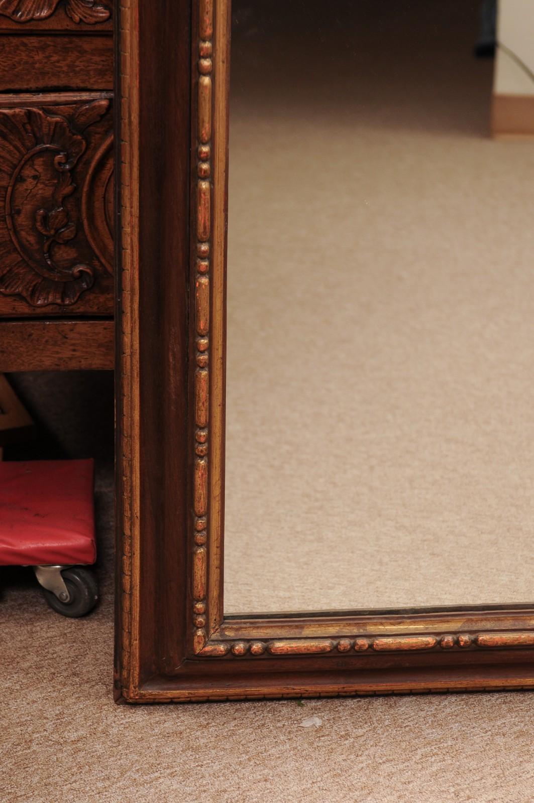 Miroir rectangulaire italien du 17ème siècle, peint en brun et sculpté en parcellaire et doré en vente 1