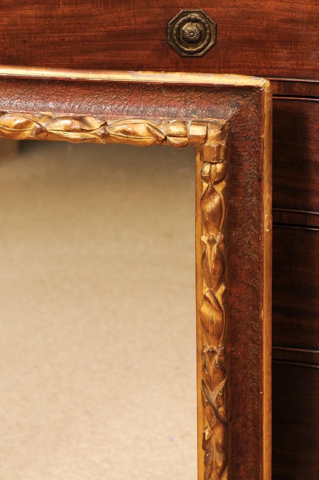 17th Century Italian Rectangular Brown Painted and Carved Parcel Gilt Mirror en venta 1
