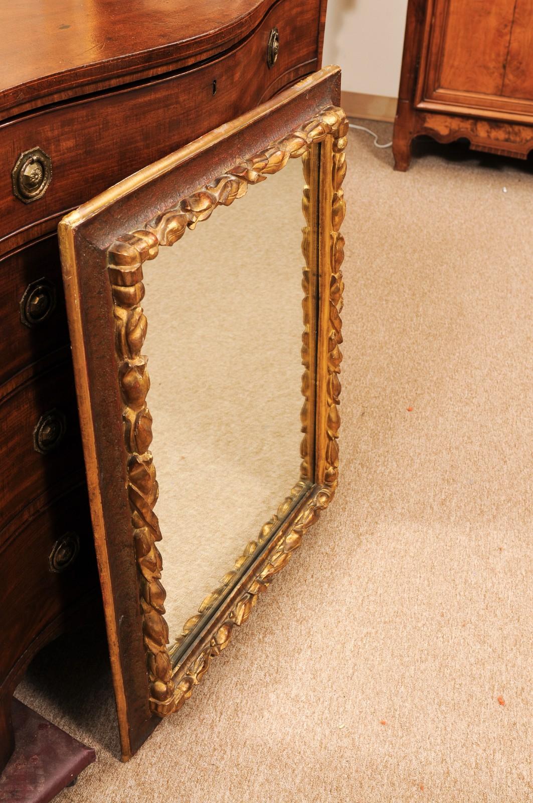 17th Century Italian Rectangular Brown Painted and Carved Parcel Gilt Mirror en venta 3
