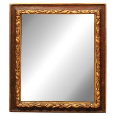 17th Century Italian Rectangular Brown Painted and Carved Parcel Gilt Mirror