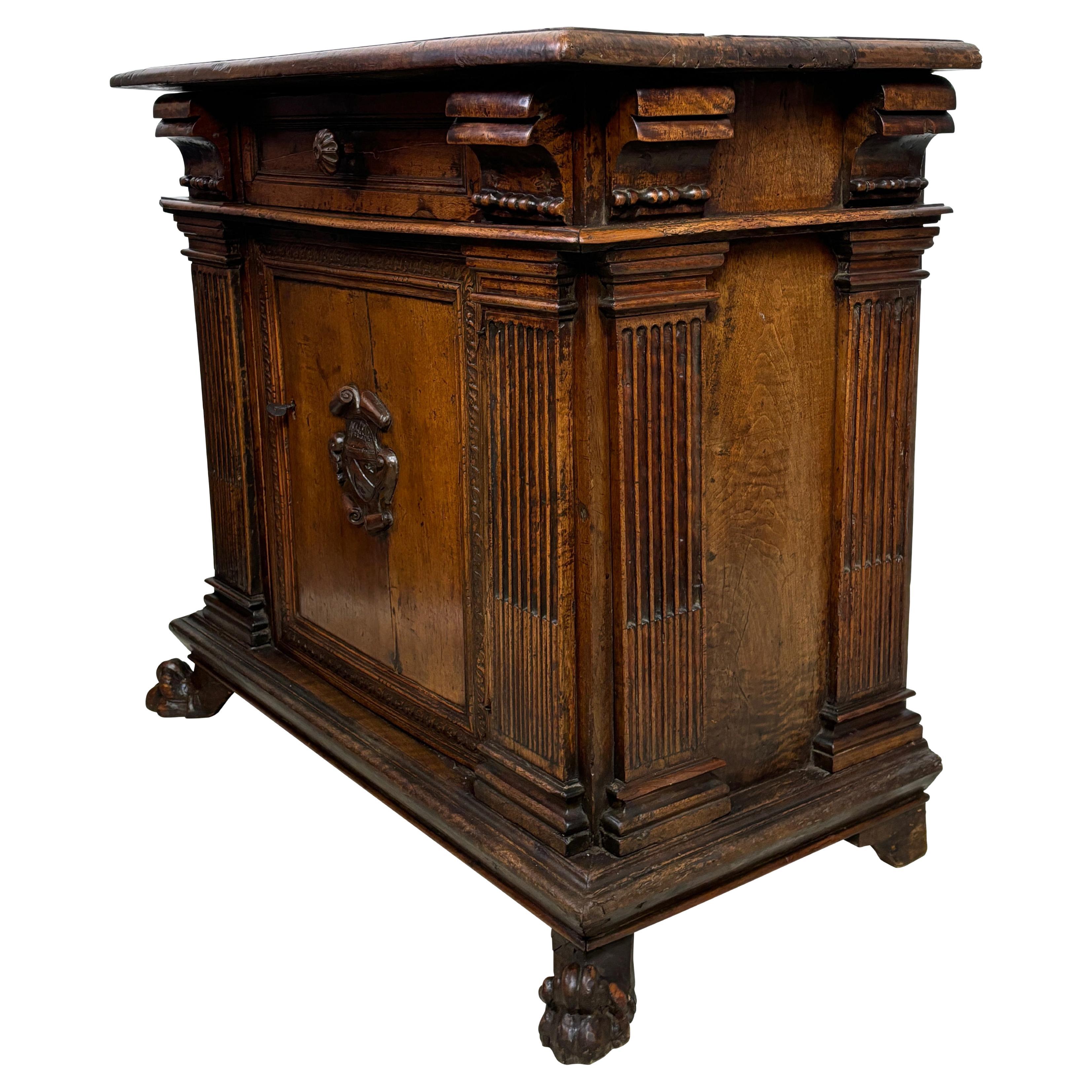 An extraordinary solid walnut Renaissance period credenza. In remarkable antique condition considering its age (400-500 years). In original condition, (a small (1/3 section) of the top back surface appears to be an old replaced board from long ago.