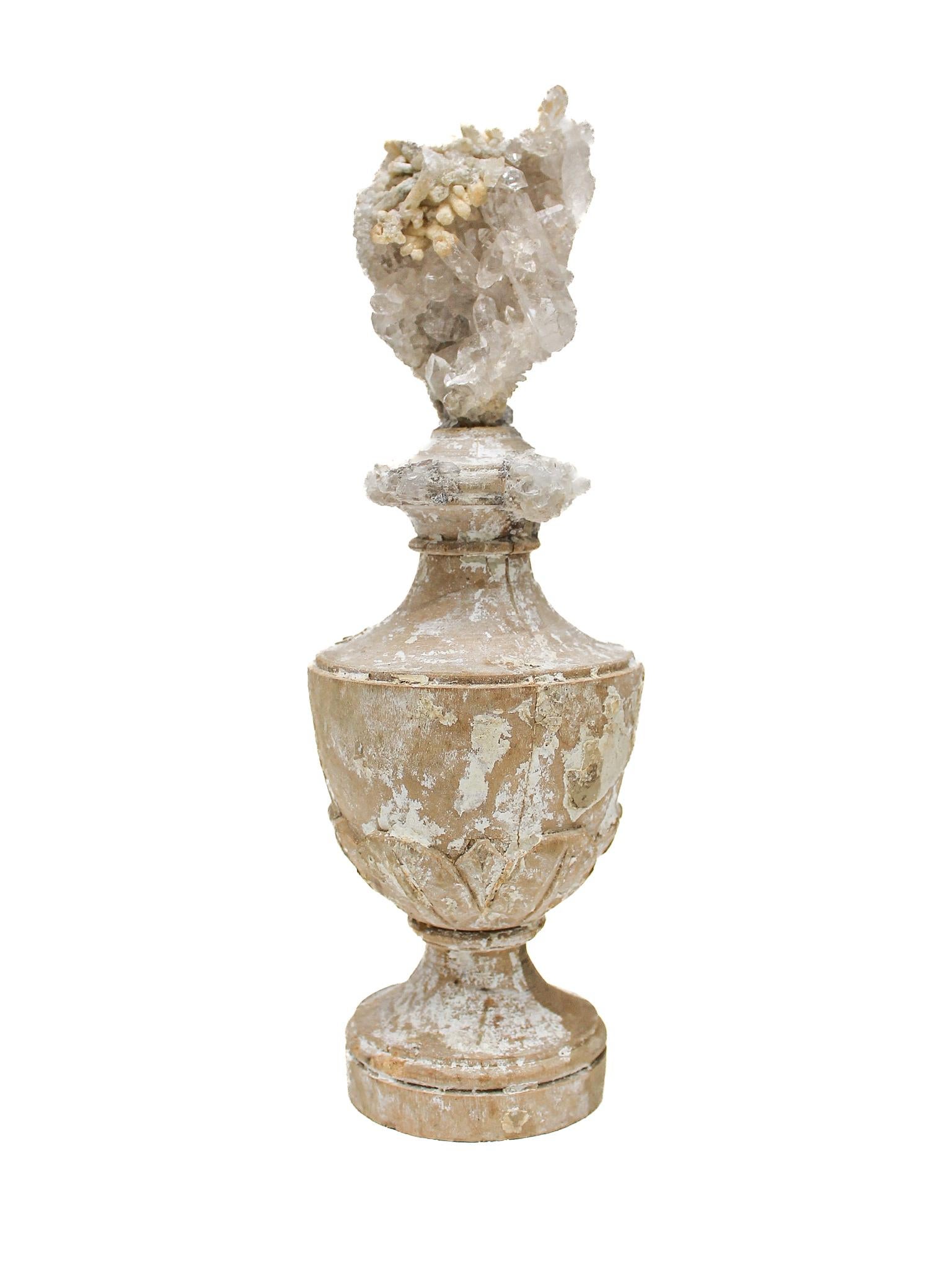 17th century Italian vase mounted with a crystal quartz cluster with calcite.

This fragment is from a church in Florence. It was found and saved from the historic flooding of the Arno River in 1966.

The piece has been naturally distressed from