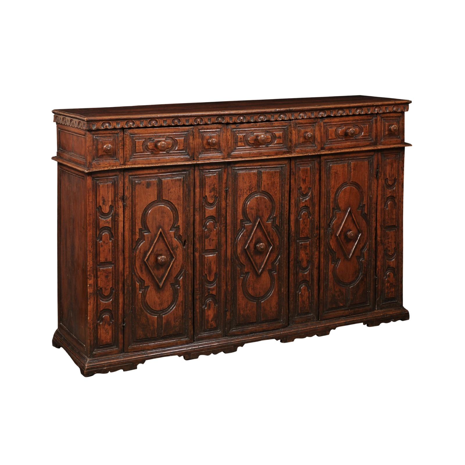 17th Century Italian Walnut Credenza with 3 Doors and 7 Drawers.