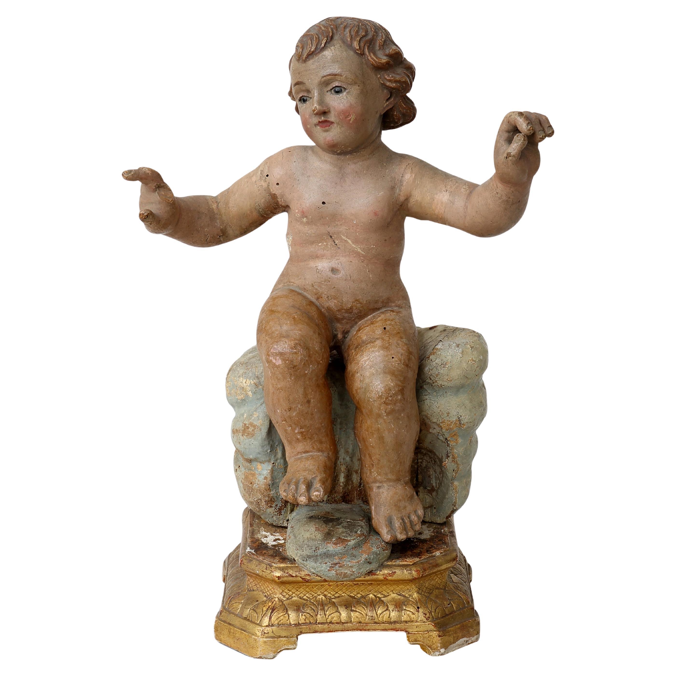 17th century Italian wooden sculpture of a baby