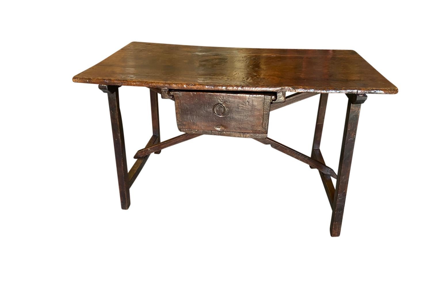 A very beautiful 17th century Writing Table - Side Table from the Piedmont region of Italy.  Wonderfully constructed from walnut with a single drawer and cross stretchers.  A minimalist design with outstanding patina - rich and luminous.