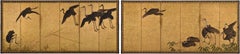 17th Century Japanese Screen Pair. Flock of Cranes. Ink and color on gold leaf.