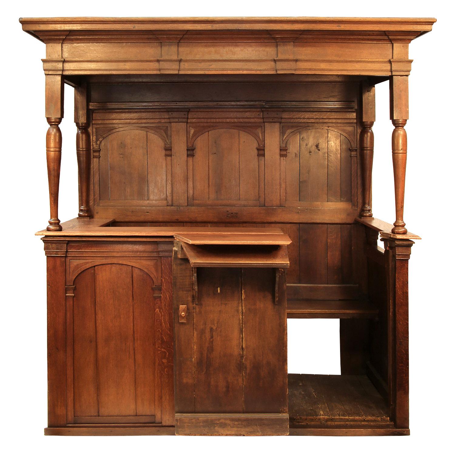 17th century large Dutch oak private pew currently converted into a bar

Originally from a church in Amsterdam. The enclosure would have been used by a noble family and probably had curtains for privacy and warmth.

The access is via a door on