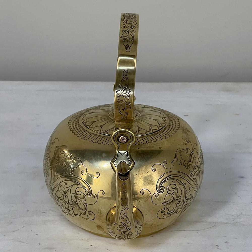 17th Century Liegoise chiseled brass water kettle is a truly special artifact, custom-made entirely by hand for an affluent client. Only the most skilled metalsmiths could craft such a well-balanced kettle from solid brass, then line it with tin