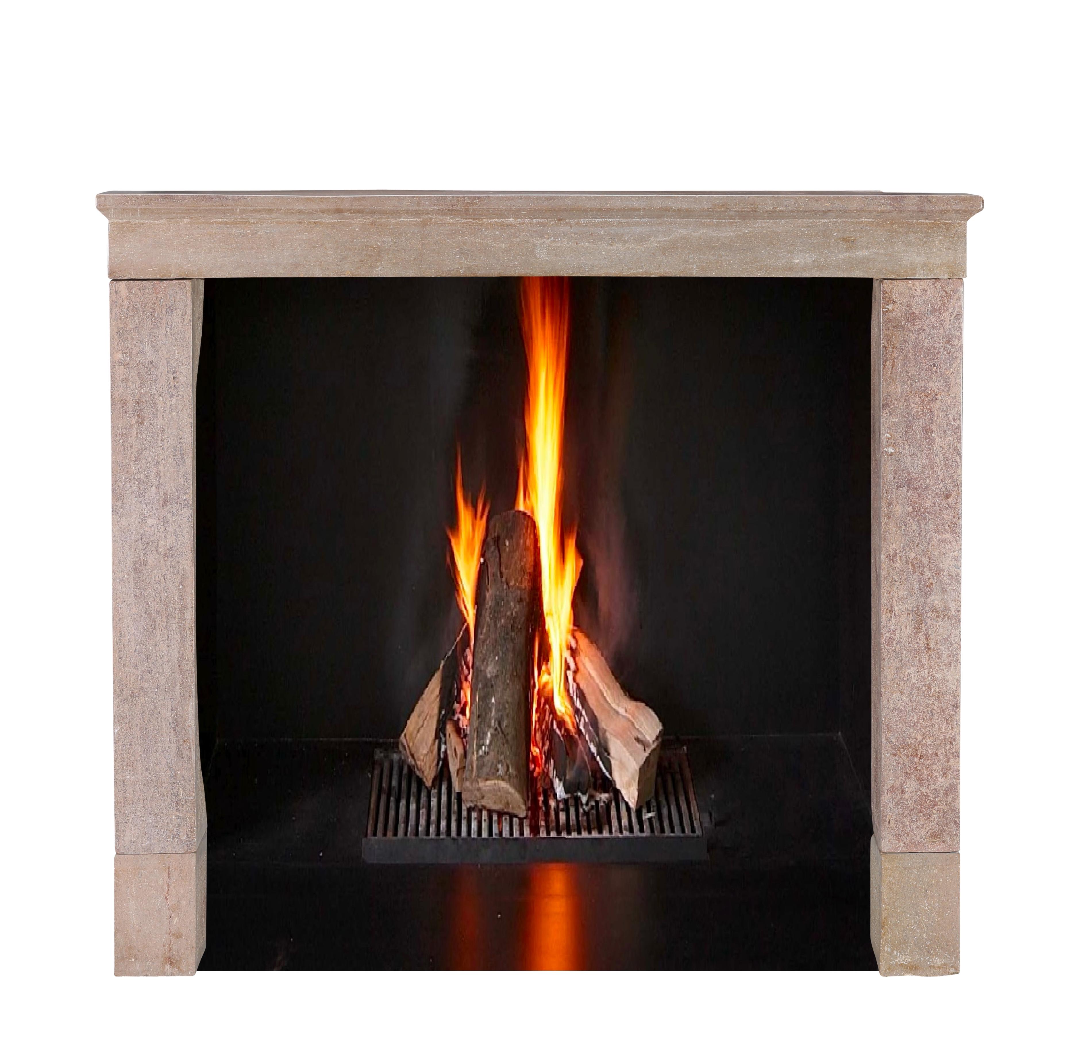French 17th Century Light Red Stone Fireplace In Timeless Rustic Style For Sale