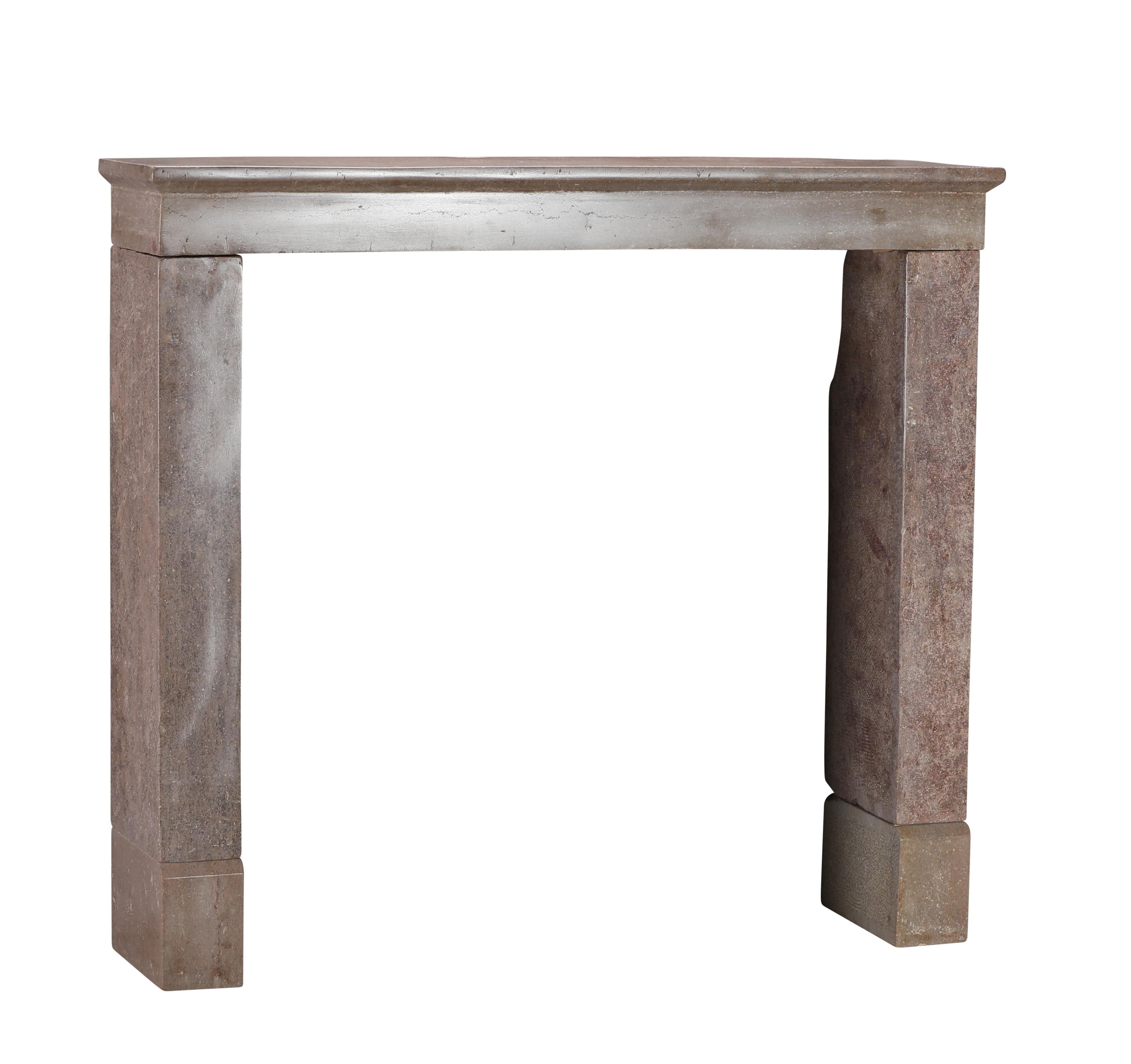 Hand-Carved 17th Century Light Red Stone Fireplace In Timeless Rustic Style For Sale
