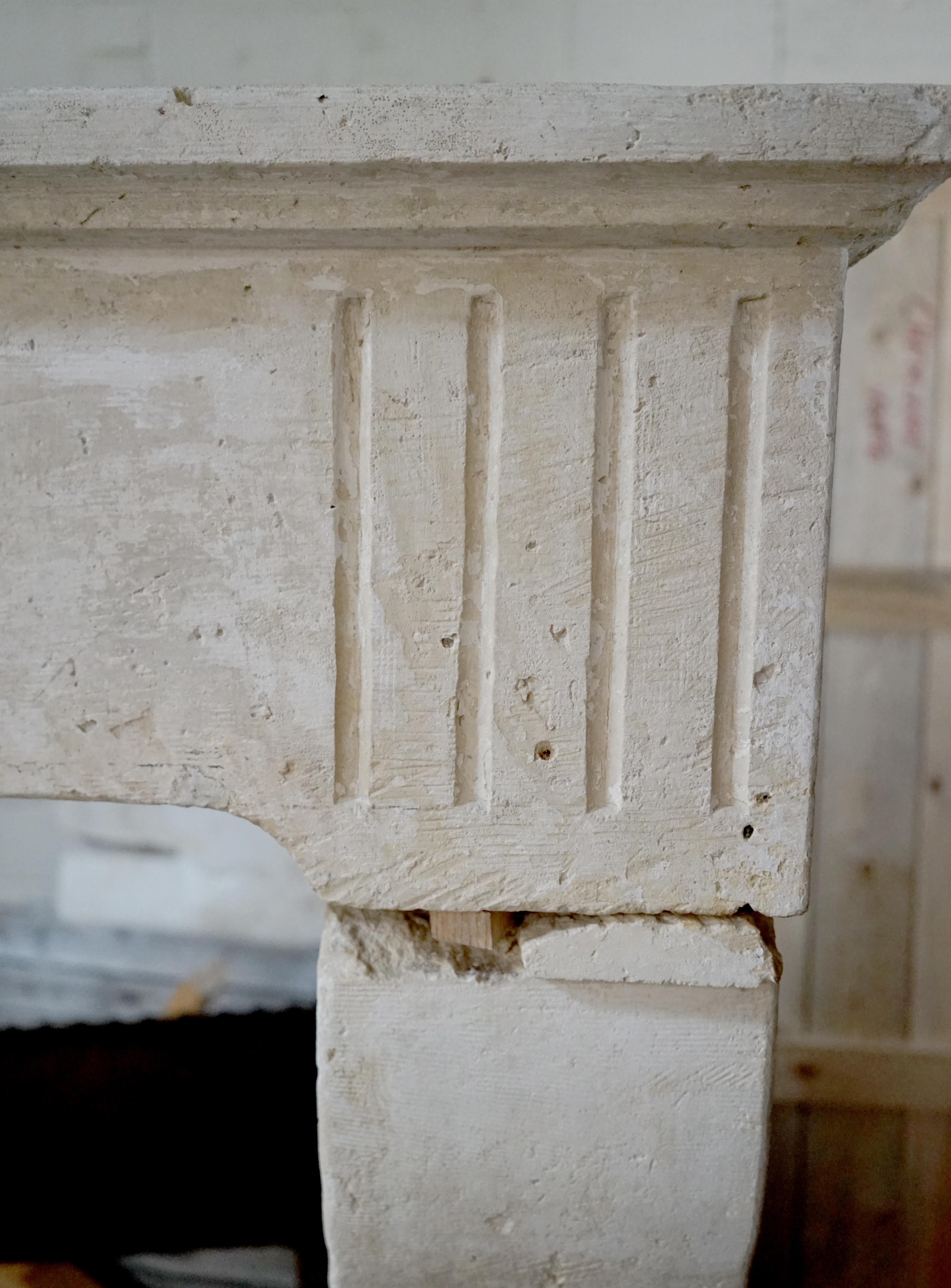 French 17th Century Limestone Fireplace