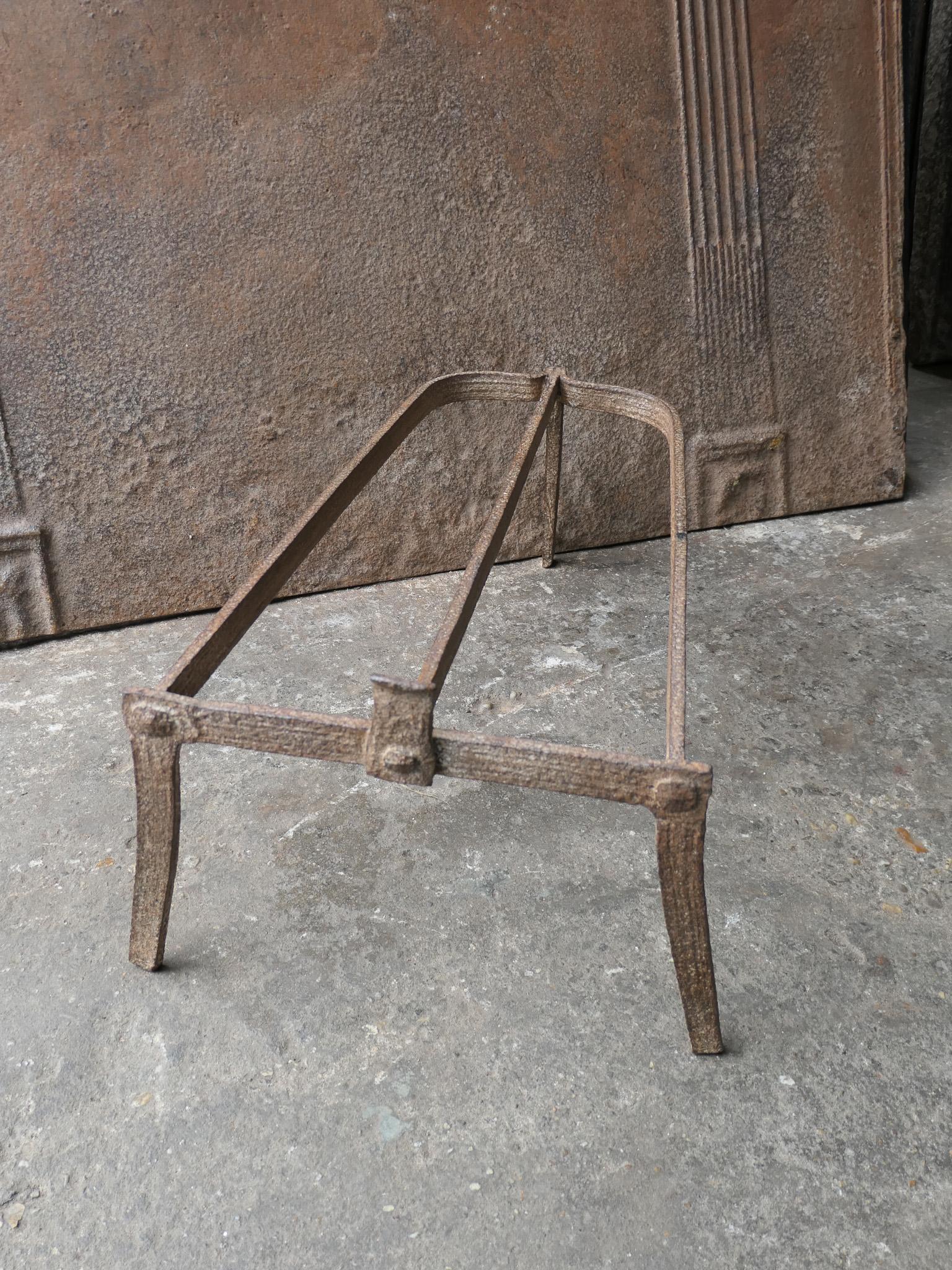 17th century French Louis XIV Period trivet. 

It is used for heating up a pan or to keep it warm in front of the fire. In a good working condition.