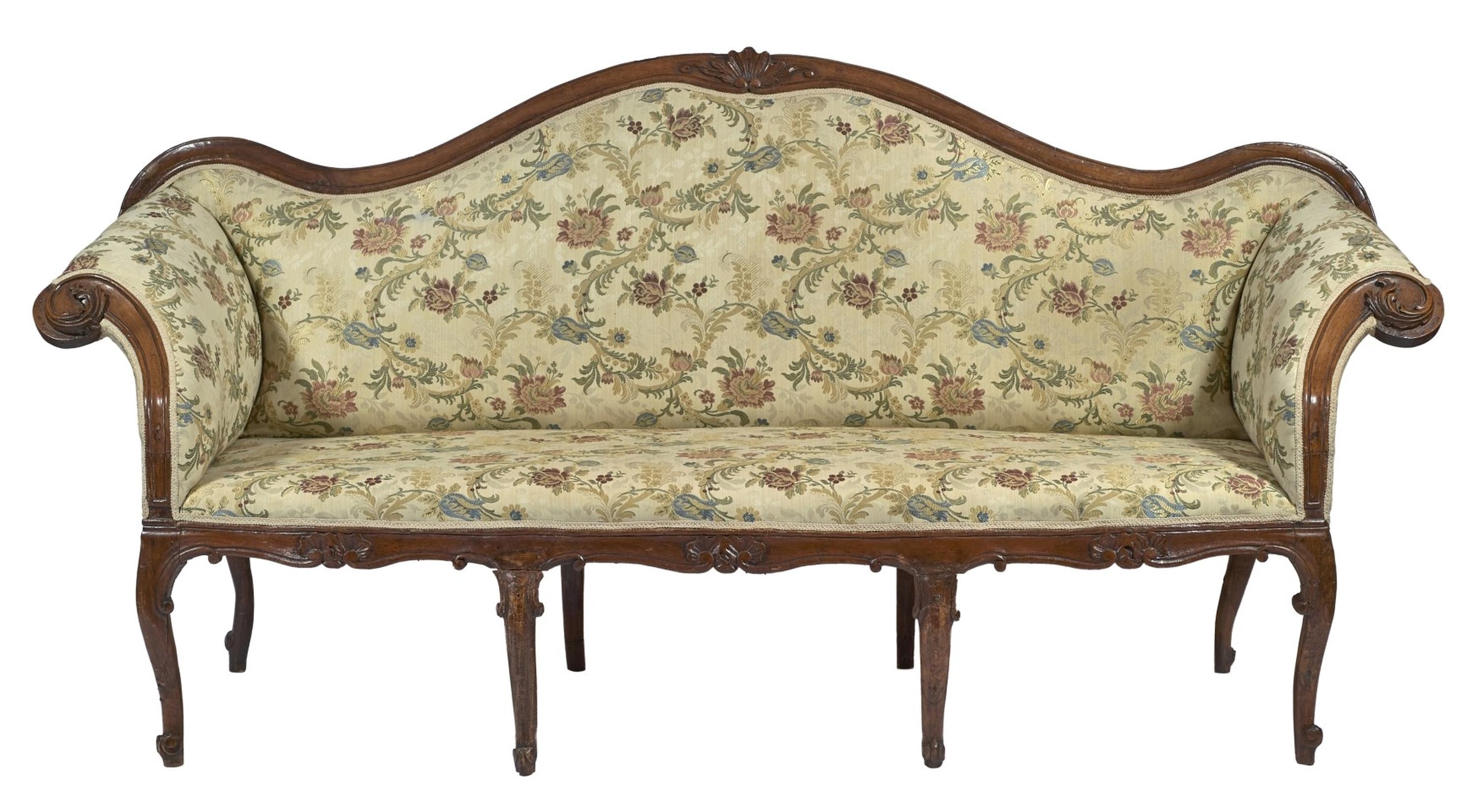 Sweet and wavy Italian winged sofa in walnut from the first half of the 18th century. with delicate fabric and absolutely of great value. 

Exceptional sofa, soft, refined possibly also from the center with a harmonious movement able to easily
