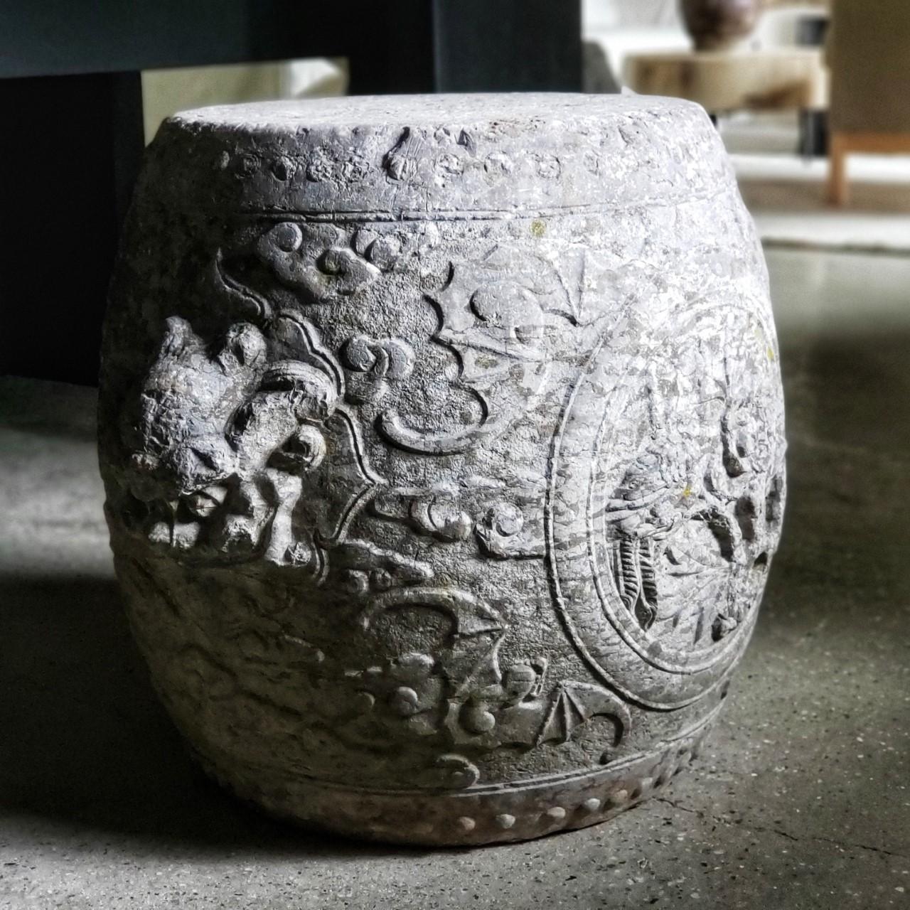 - Sold individually or as a pair -

17th Century Ming Dynasty carved stone barrel, with Foo Dog handles, floral reliefs and bat wing decoration. The Chinese symbol for bat and for good luck is the same, thus the use of bats for symbolism.

NOTES: