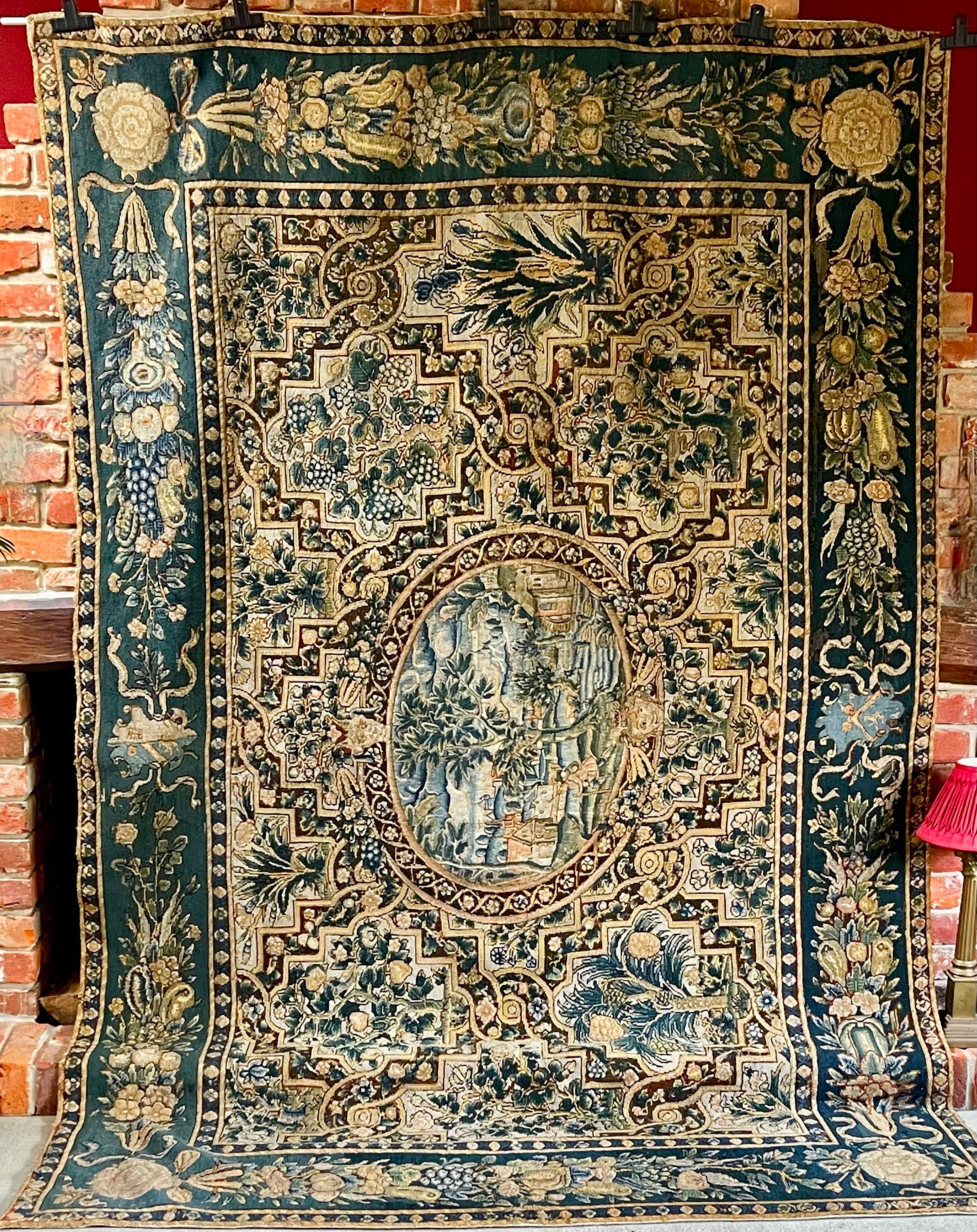UN RARO TAPETE HERÁLDICO DE MESA  SIGLO XVII

Hacia 1650 Probablemente Países Bajos

 Totalmente trabajada a mano en punto grueso y petit point de seda y lana.  Cartela central oval petit point de una escena del siglo XVII

El entorno trabajaba con