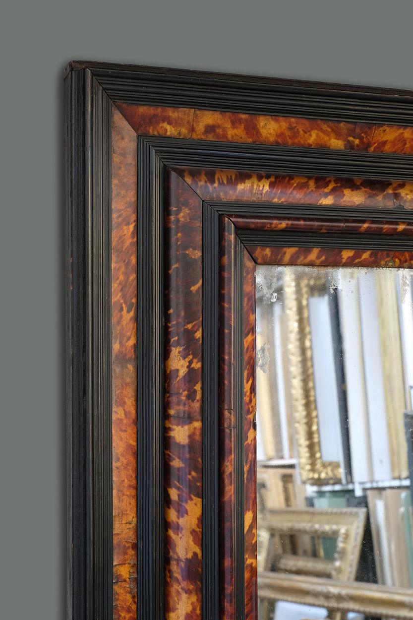 A rare and extremely high quality, 17th century Netherlandish (Antwerp) Cabinetmaker's frame. It has a compound profile, with pine carcass veneered in tortoiseshell on a gold ground with reeded Indian ebony mouldings the frame retains its original