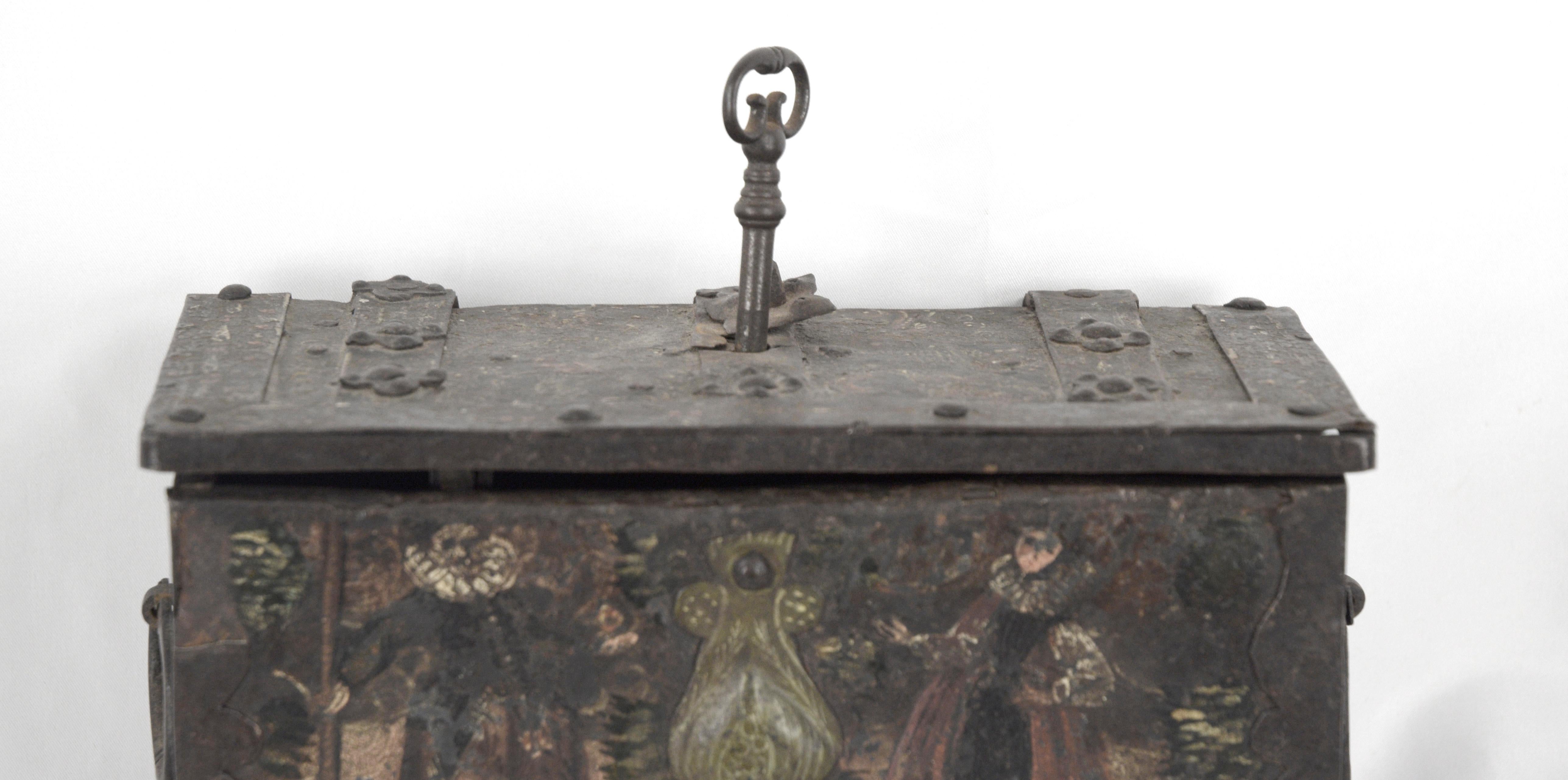 Ornately painted cash box with iron hardware and key, on the original stand. Interior of box measures 8