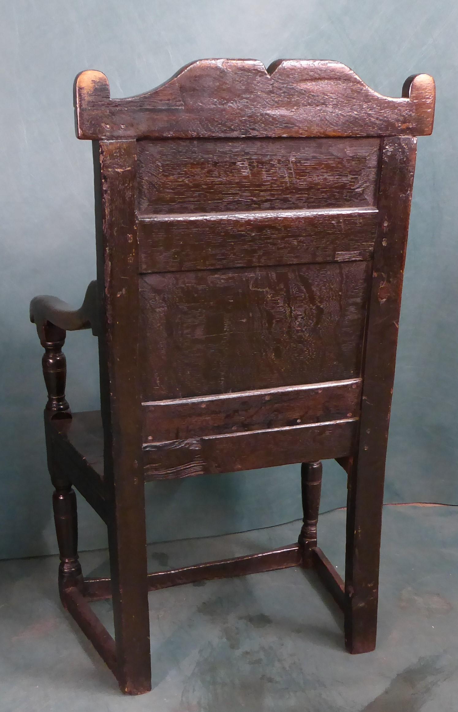 A good 17th century oak chair with carved back and original patina of a lovely attained gloss , the chair glows of age with beauty.   The Chair would have been higher however due to wear over the years on stone floors much used and loved which is