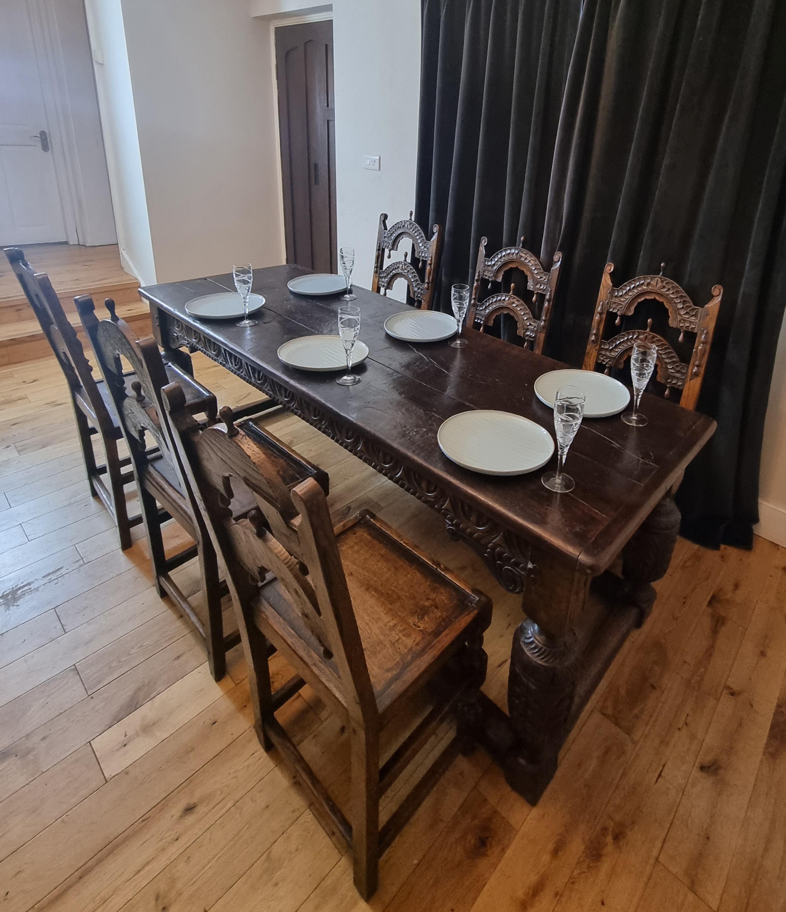 British 17th Century Oak Refectory Table and Six 17th Century Oak Dining Chairs