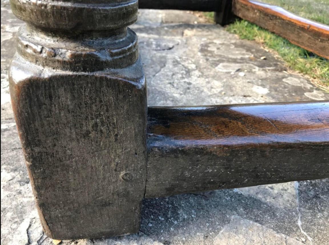 A rare English 17th-century oak refectory table. Charles II period, ca 1675.

The three-plank cleated detachable top is of superb color, figuring and patination.
Raised on six baluster supports united by stretchers.
The frieze is guilloche-carved on