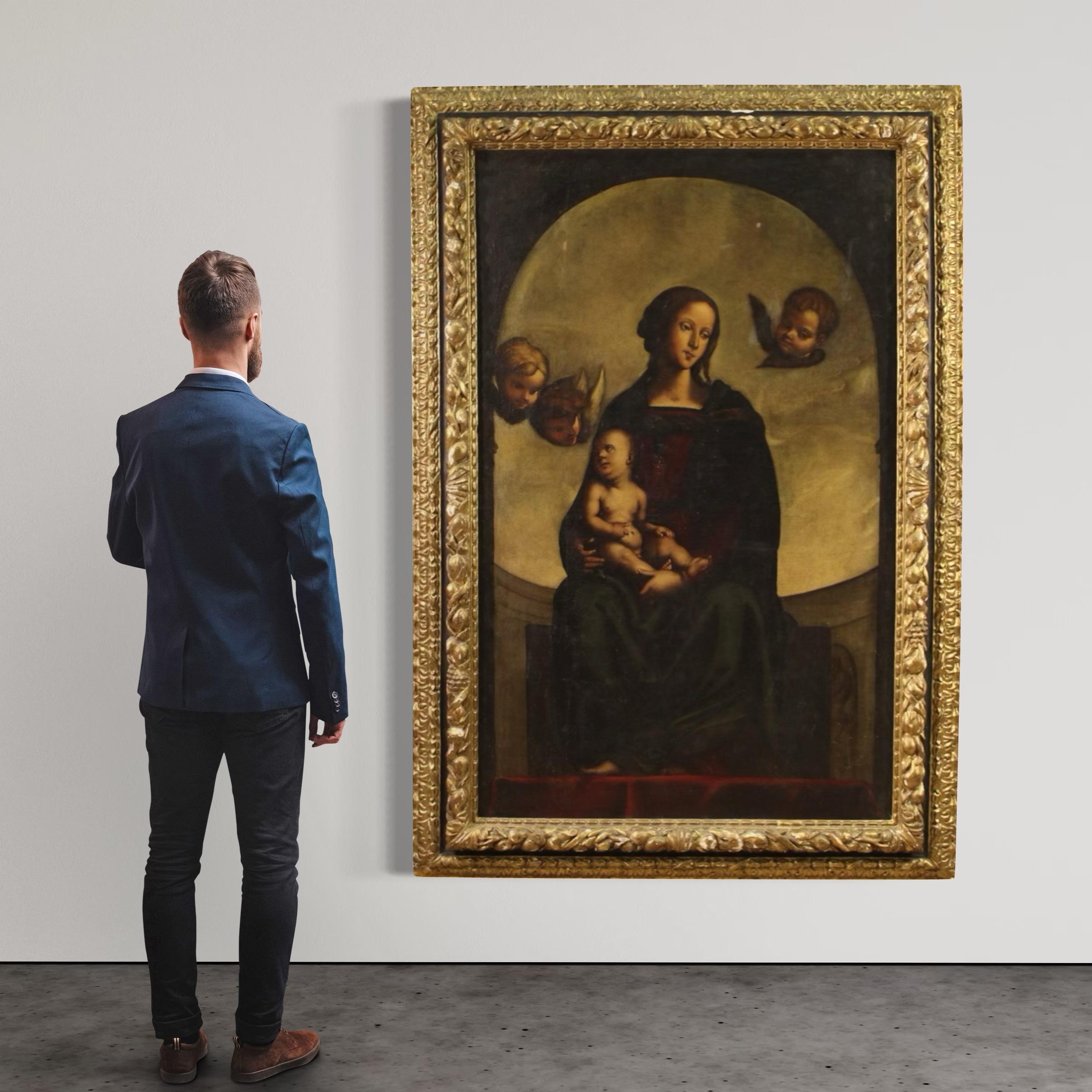 Un magnifique retable de la seconde moitié du XVIIe siècle. La peinture à l'huile sur toile représente une splendide Madone à l'enfant parmi des chérubins, un thème iconographique très répandu dans la peinture italienne de l'époque.

La Vierge est
