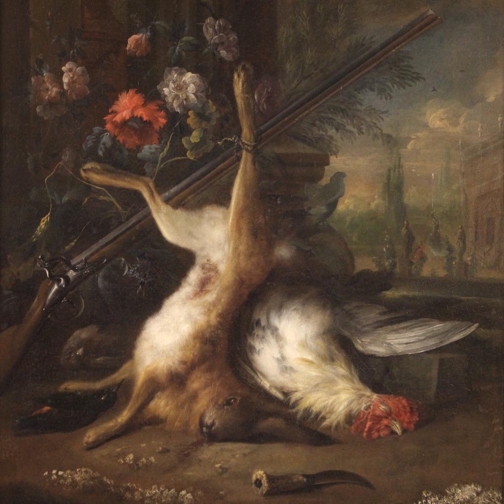 Stunning 17th century English painting. Artwork oil on canvas depicting Still life with hare, rooster and rifle of excellent pictorial quality. Artwork of great size and impact adorned with a modern frame, in wood and plaster, carved and gilded