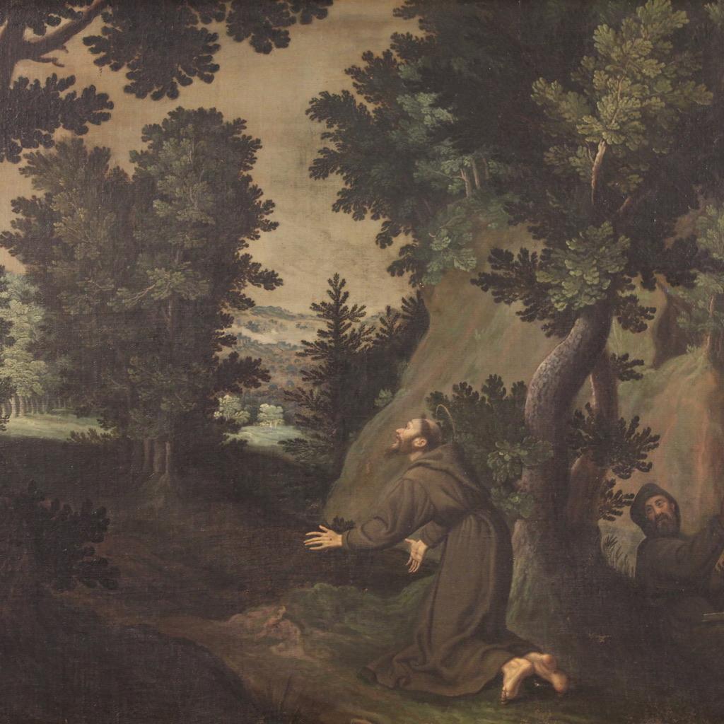 Ancient religious painting from the 17th century. Artwork depicting Saint Francis of Assisi in prayer immersed in a splendid landscape. Next to the saint (bottom right) we find another friar near a source. At the top left is a Seraph, the angels