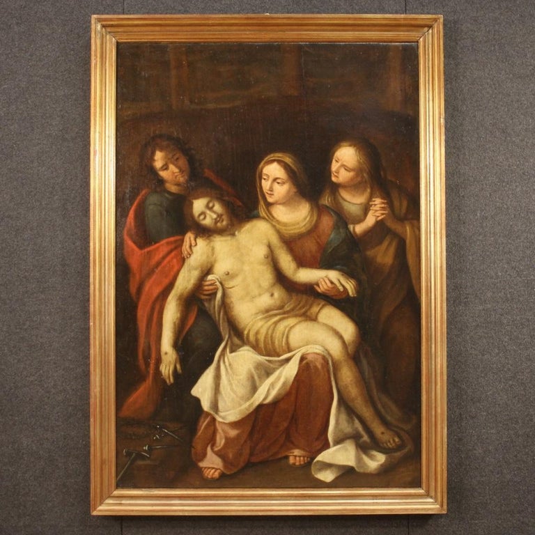 Antique Flemish painting from the 17th century. Framwork oil on canvas depicting a religious subject, Piety with the dead Christ lying on Mary's legs and two Saints behind him. Painting of great measure and impact for antique dealers, interior