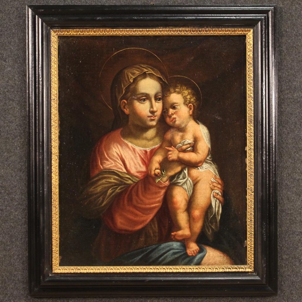 Antique Italian painting from the late 17th century. Framework oil on canvas depicting a religious subject Virgin with child of good pictorial quality. Framework of excellent proportion and quality finely represented in detail. Interesting is the