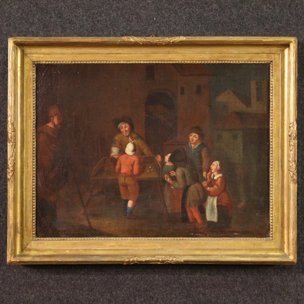 Antique Flemish painting from the 17th century. Artwork oil on canvas depicting a popular scene with characters The game of dice of good pictorial quality. Artwork of limited size and excellent proportion adorned with a wooden and plaster frame, not