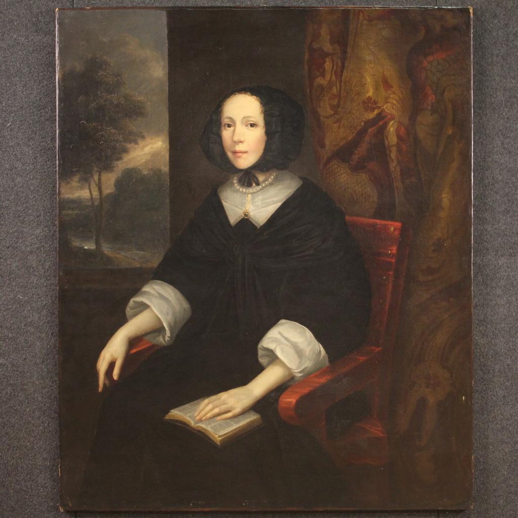 Antique Flemish painting from the second half of the 17th century. Oil on canvas artwork depicting a female portrait, Young lady with book, of excellent pictorial quality. The glimpse with the landscape to the left of the woman is pleasant (see