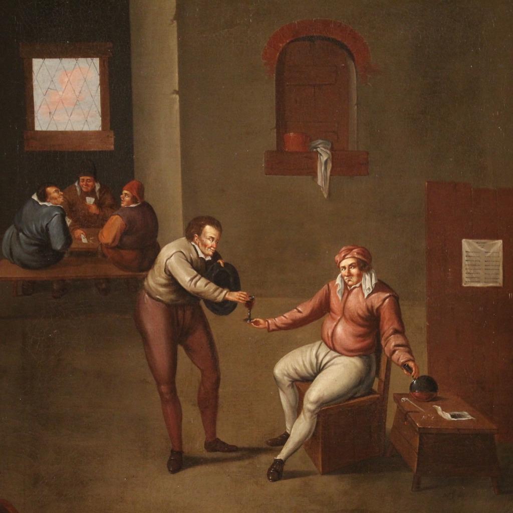 Antique Flemish painting from the 17th century. Oil on canvas artwork depicting a tavern interior scene with characters of excellent pictorial quality. Refined painting, for antique dealers and collectors of Flemish paintings from the early 1800s.